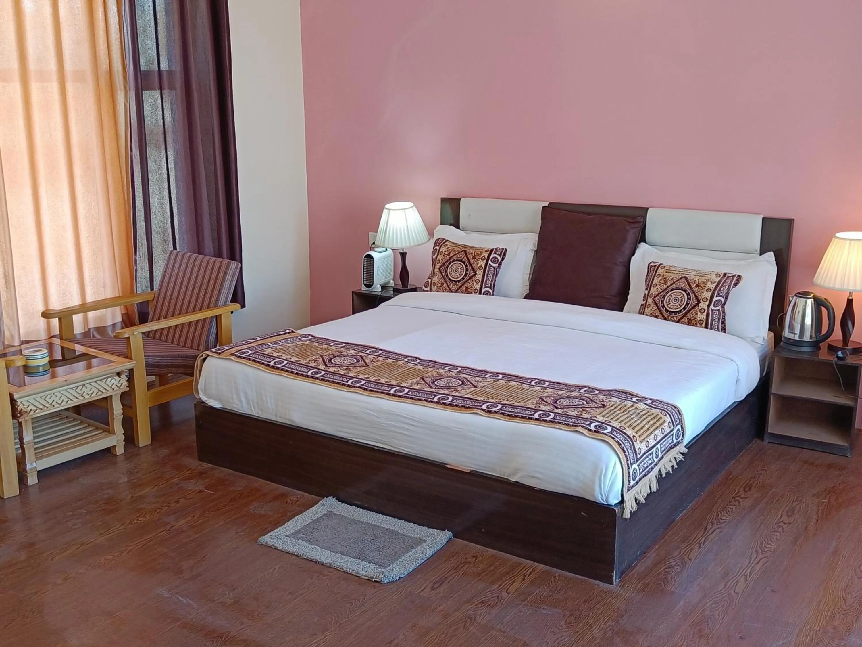 Bed in Hotel Malik Residency