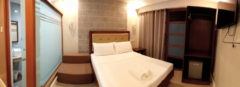 Bed in Panglao Alona Suites