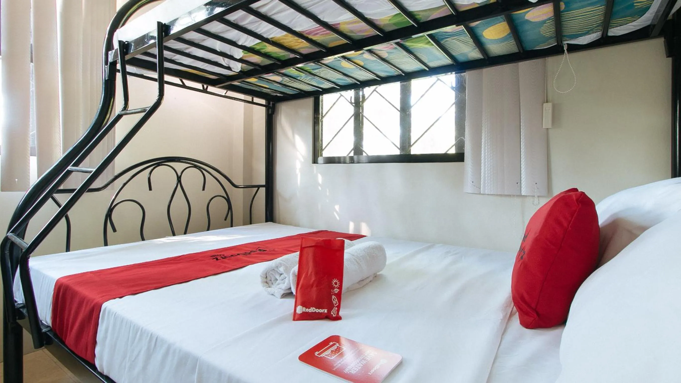 Photo of the whole room, Bed in RedDoorz Sonia Unidos Magroves Garden Resort RedPartner