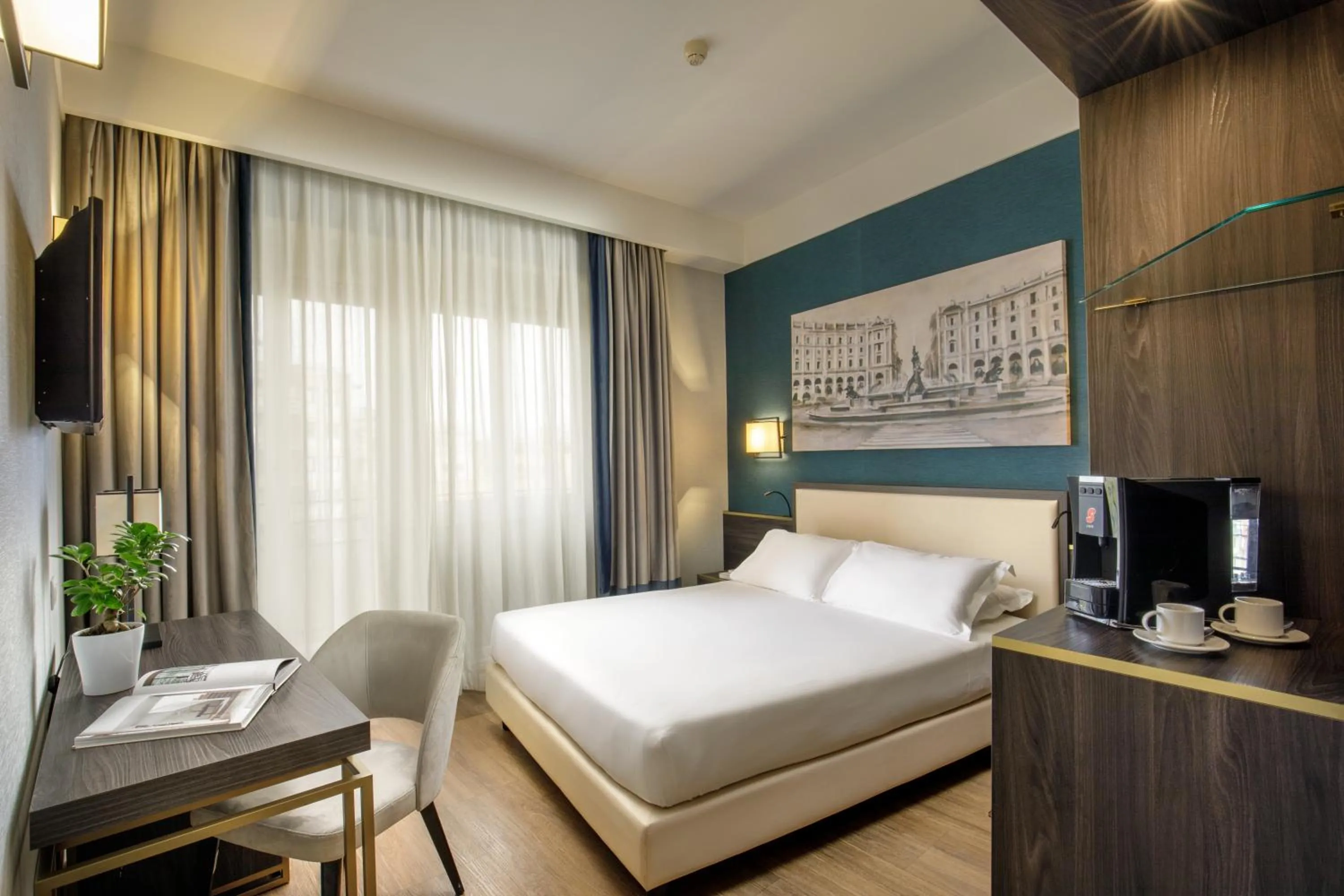 Bed in Hotel Santa Costanza by OMNIA hotels