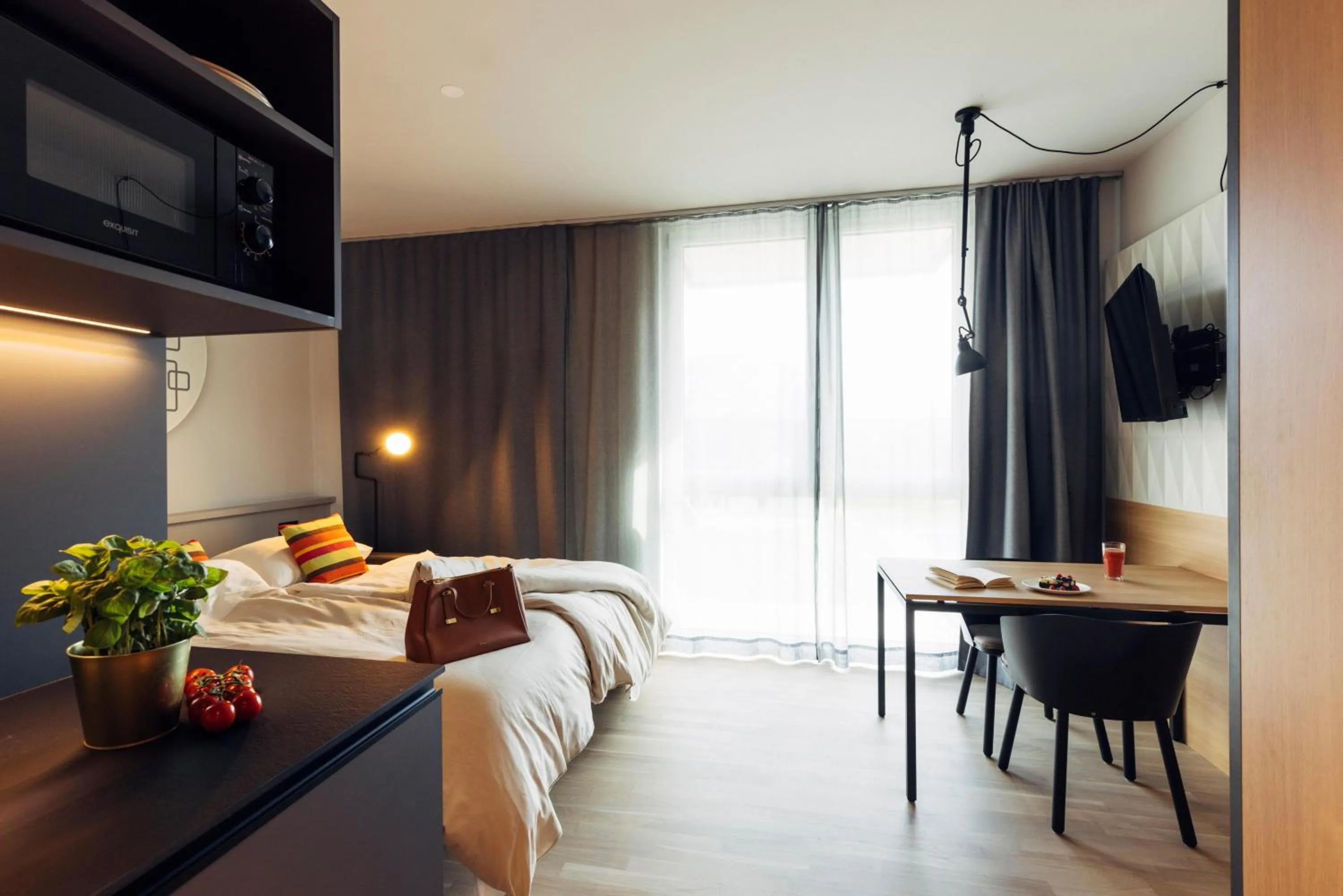 Photo of the whole room, Bed in harry's home Telfs hotel & apartments