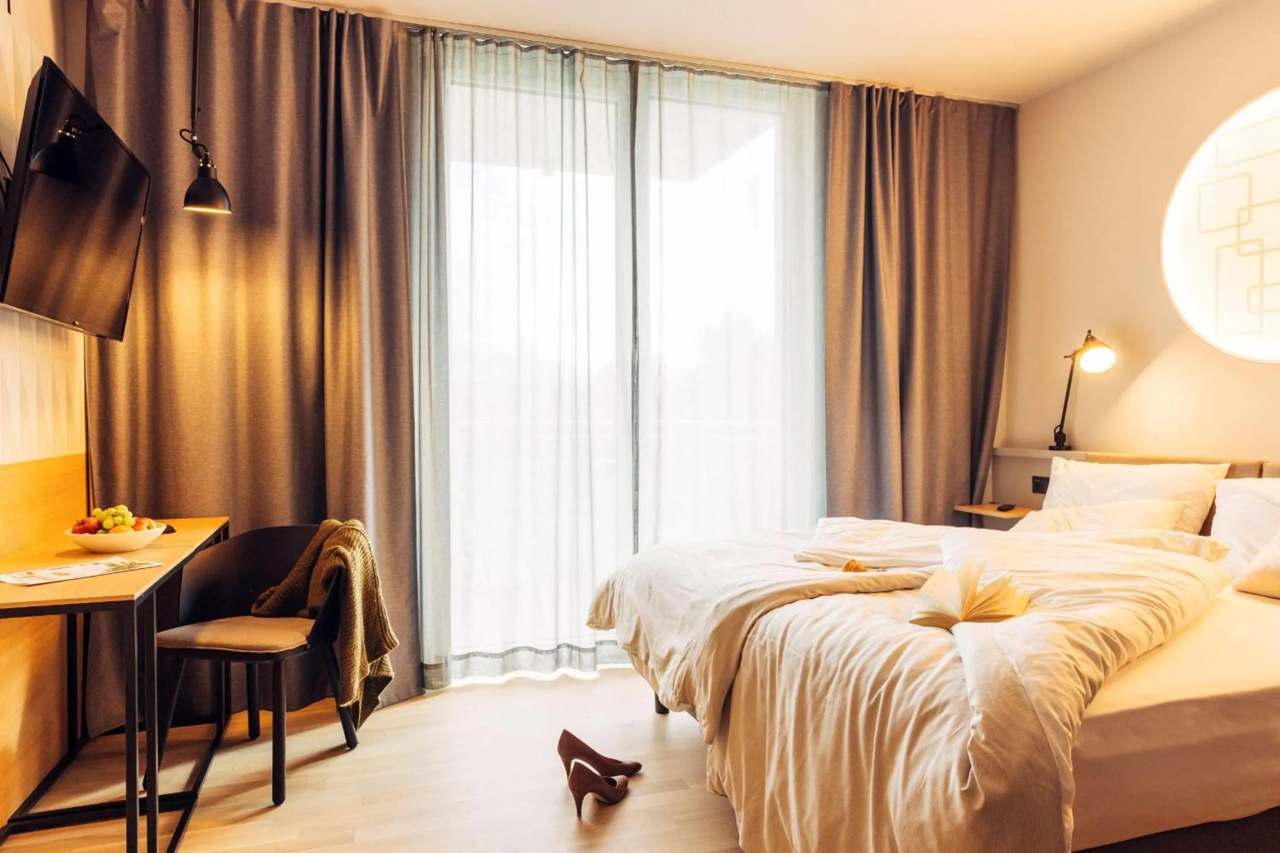 Photo of the whole room, Bed in harry's home Telfs hotel & apartments