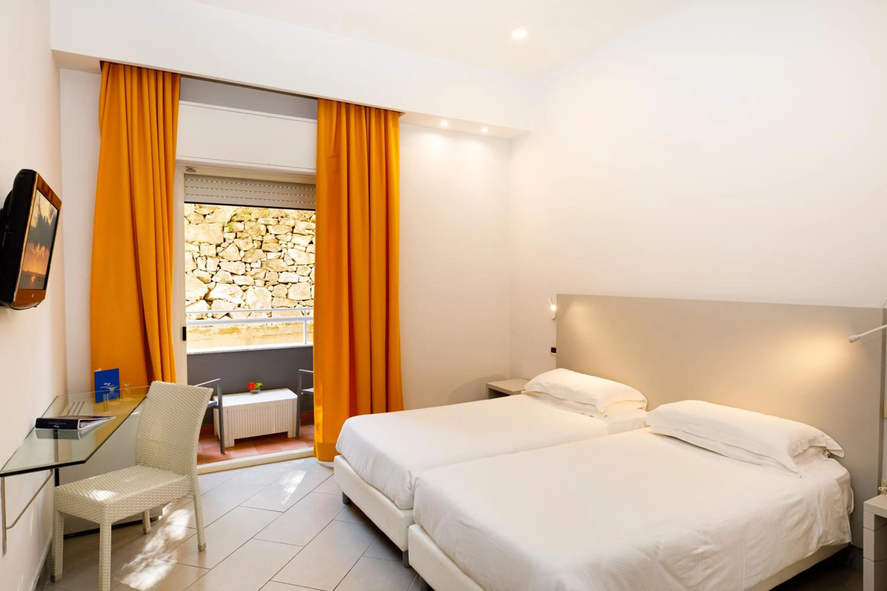 Bed in Art Hotel Gran Paradiso