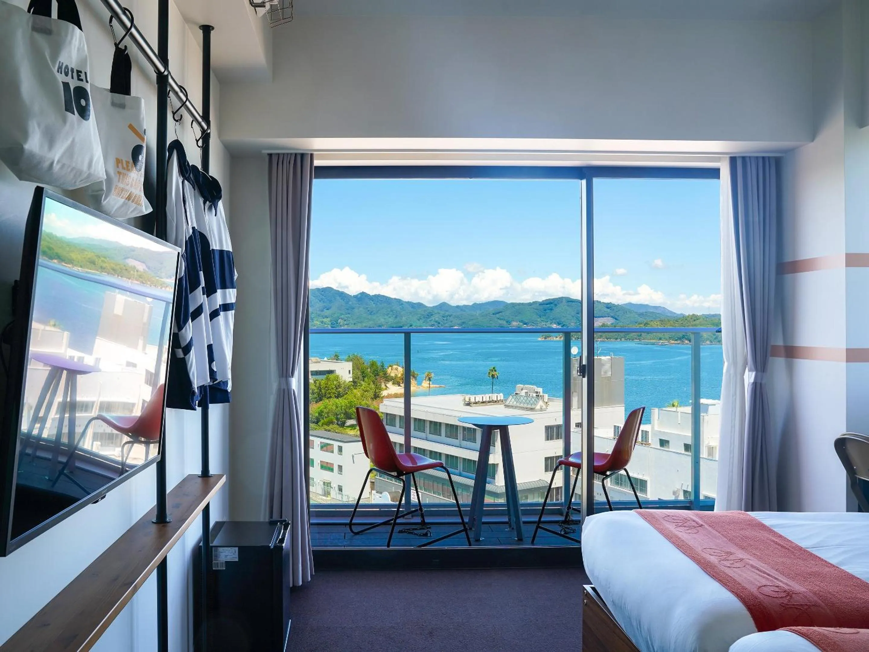 View (from property/room), Bed in SETOUCHI KEIRIN HOTEL 10 by Onko Chishin