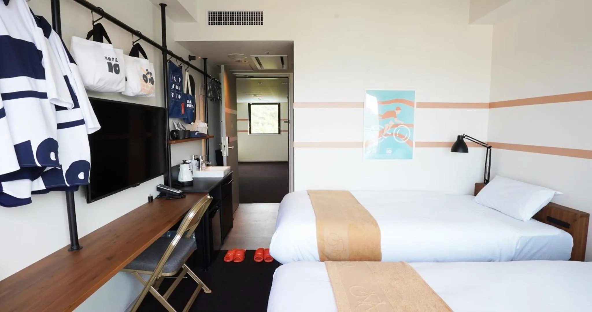 Photo of the whole room, Bed in SETOUCHI KEIRIN HOTEL 10 by Onko Chishin