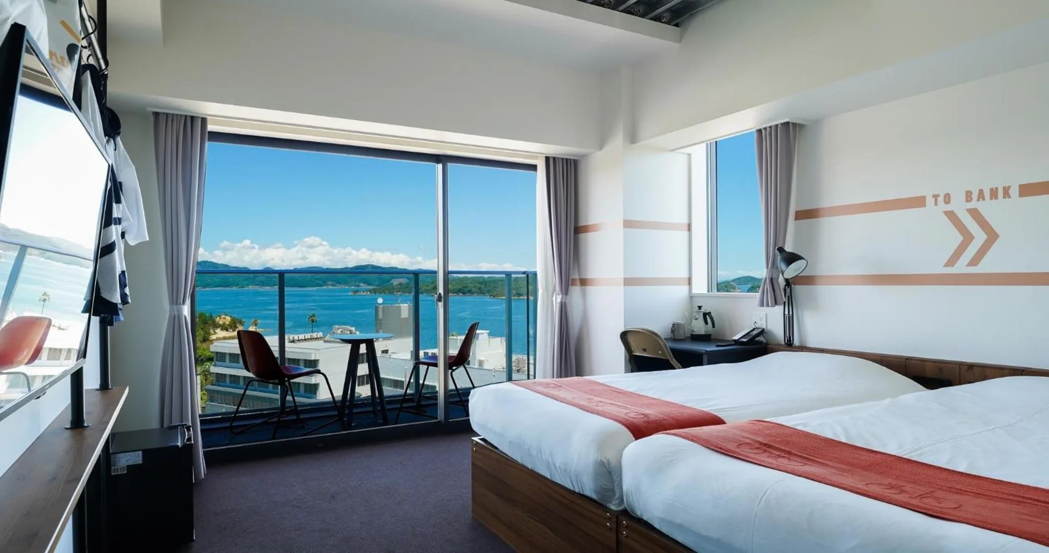 Superior Twin Room with City View in SETOUCHI KEIRIN HOTEL 10 by Onko Chishin