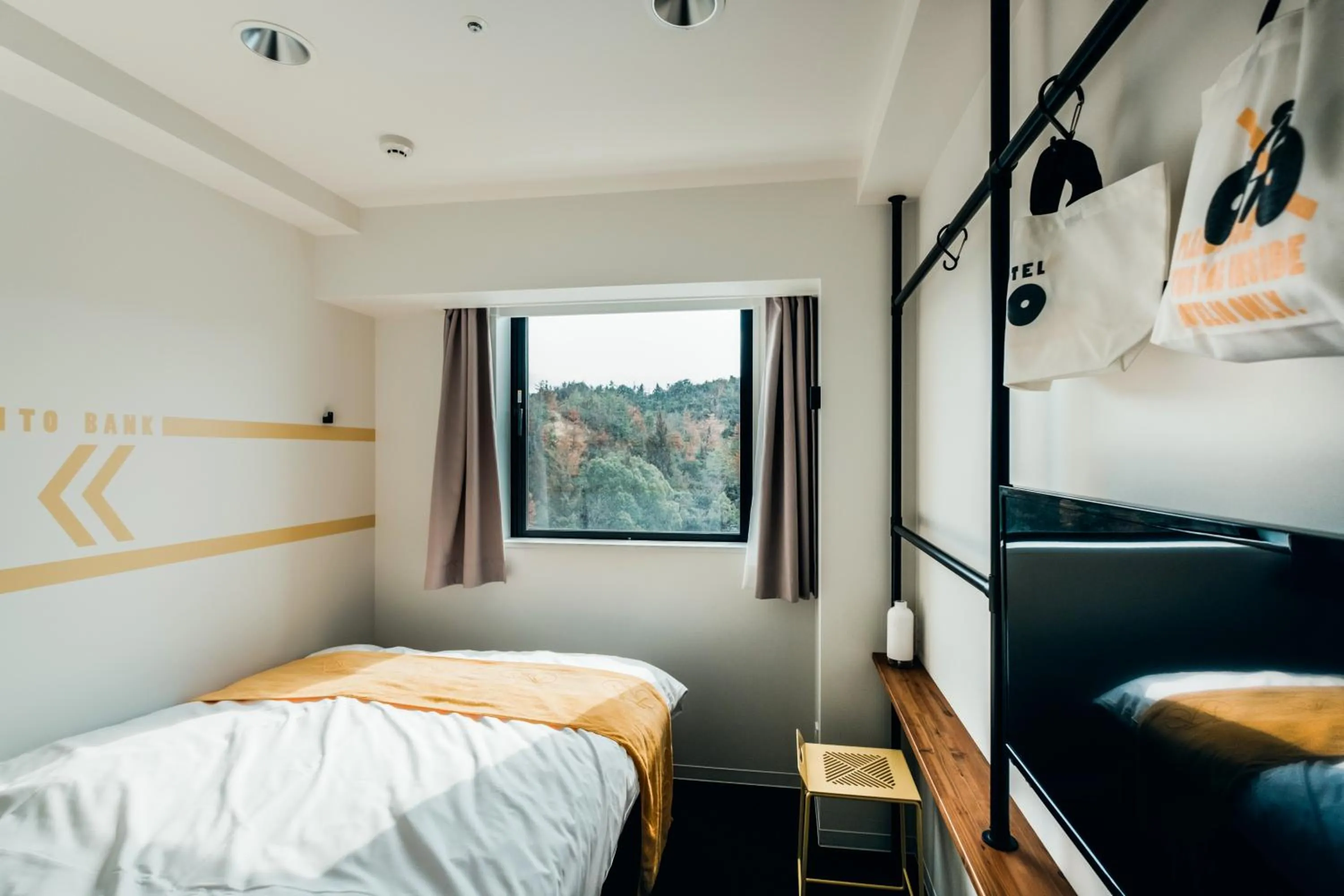 Photo of the whole room, Bed in SETOUCHI KEIRIN HOTEL 10 by Onko Chishin