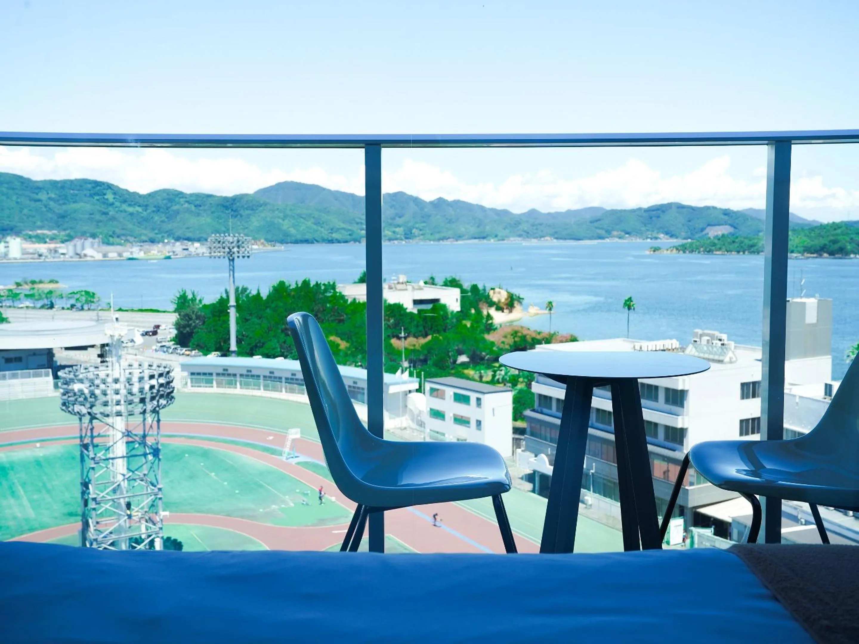 Balcony/Terrace in SETOUCHI KEIRIN HOTEL 10 by Onko Chishin