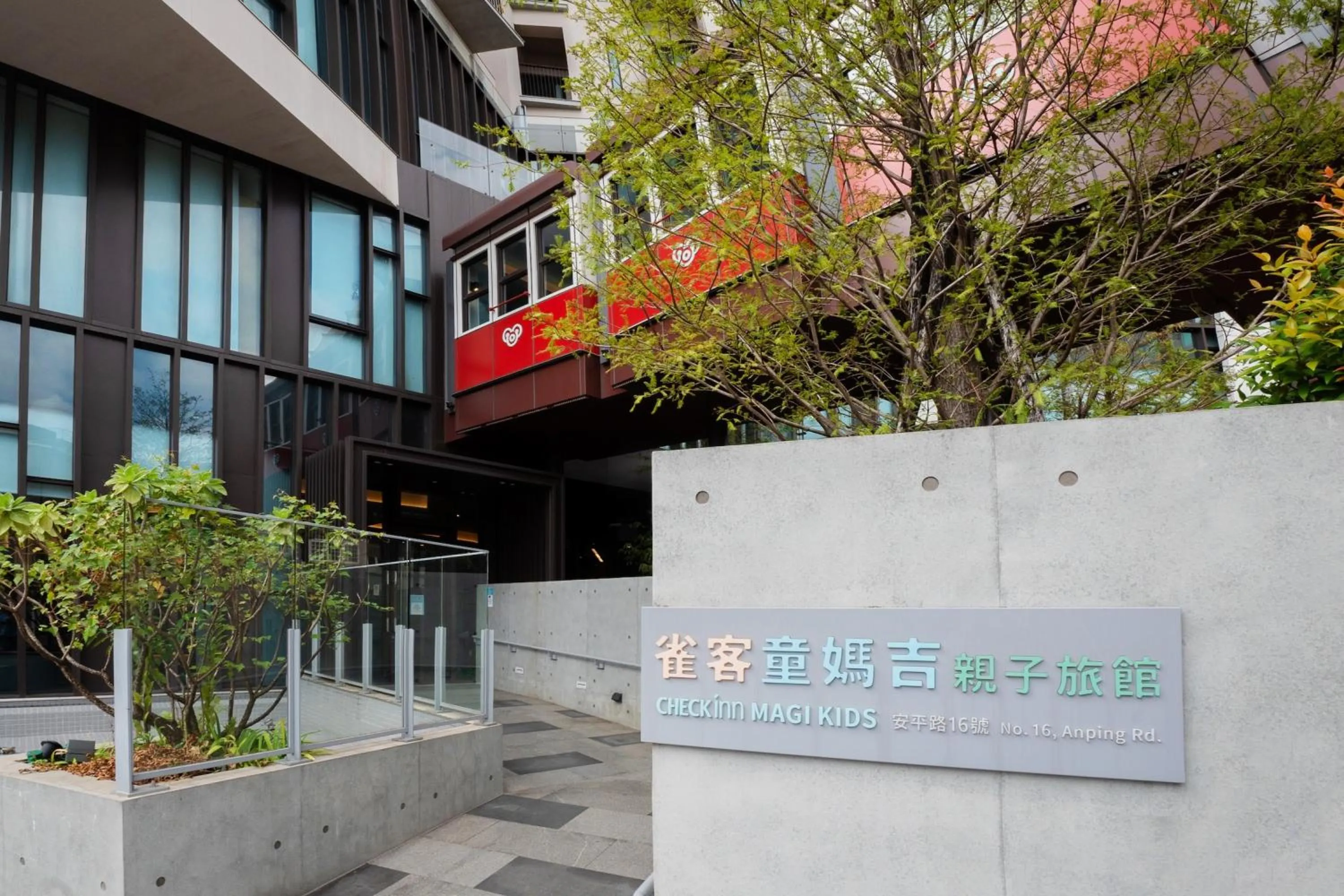 Property building in CHECK inn MAGI Kids Hotel