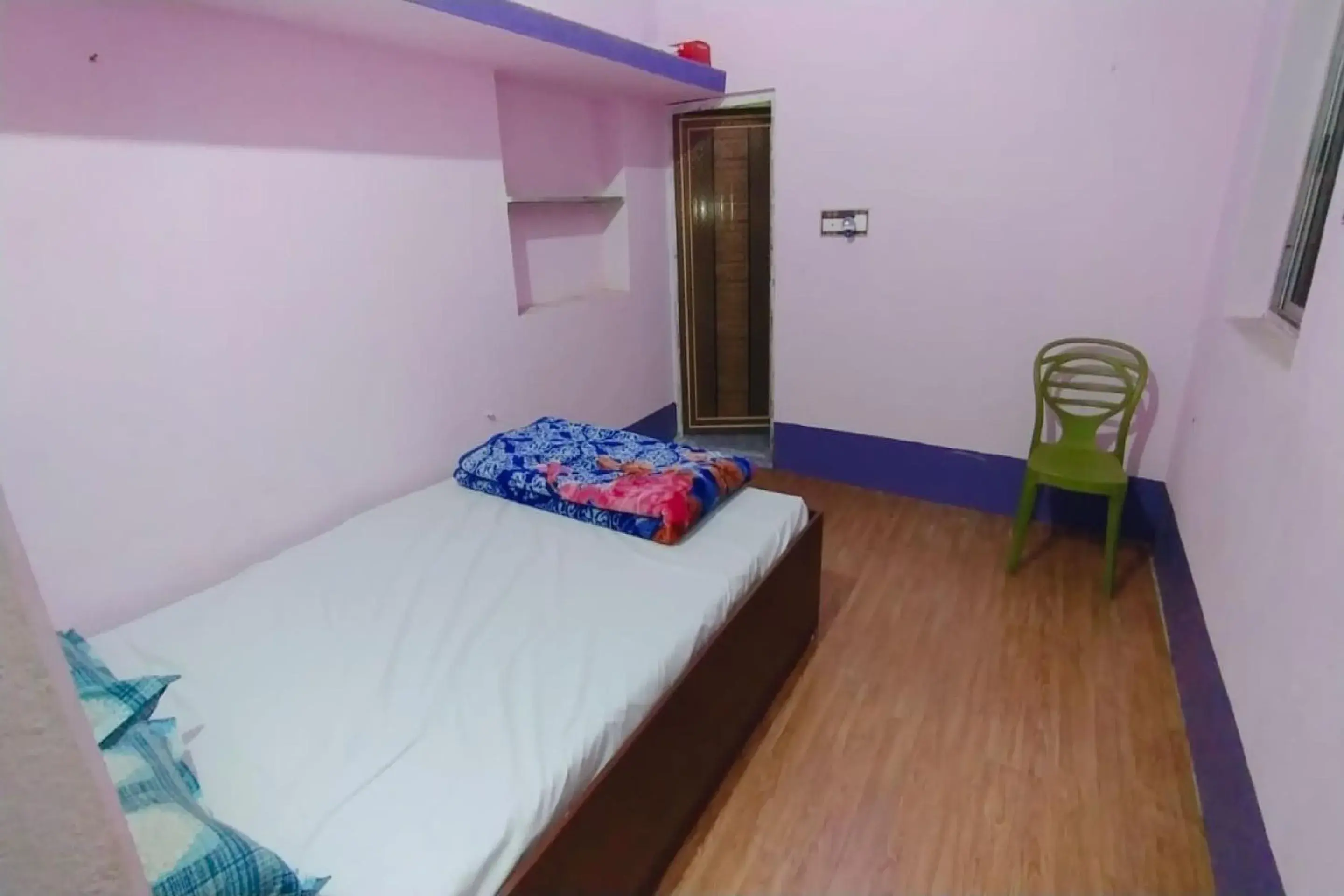 Bedroom in SPOT ON Ganguly Hotel Lodging And Fooding Bedroom in SPOT ON Ganguly Hotel Lodging And Fooding