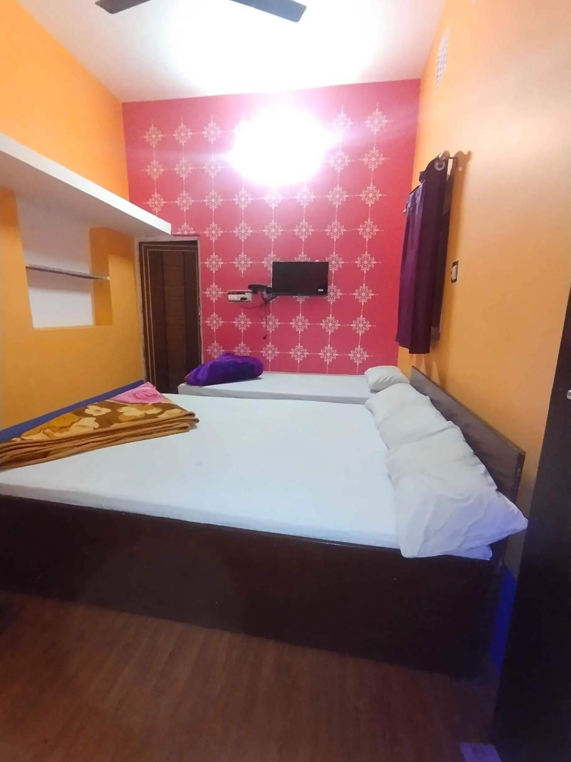 Bedroom in SPOT ON Ganguly Hotel Lodging And Fooding