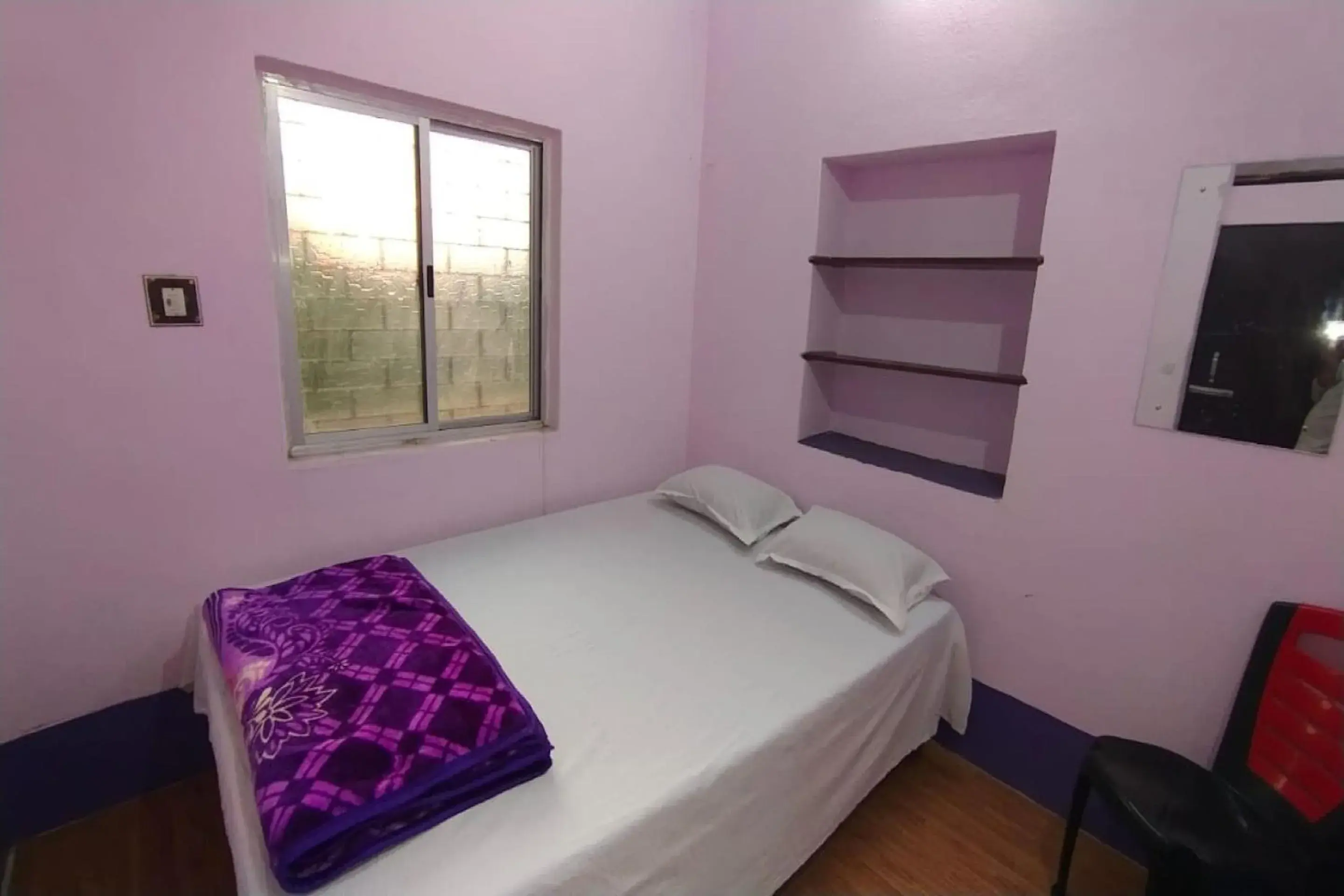 Bedroom in SPOT ON Ganguly Hotel Lodging And Fooding Bedroom in SPOT ON Ganguly Hotel Lodging And Fooding