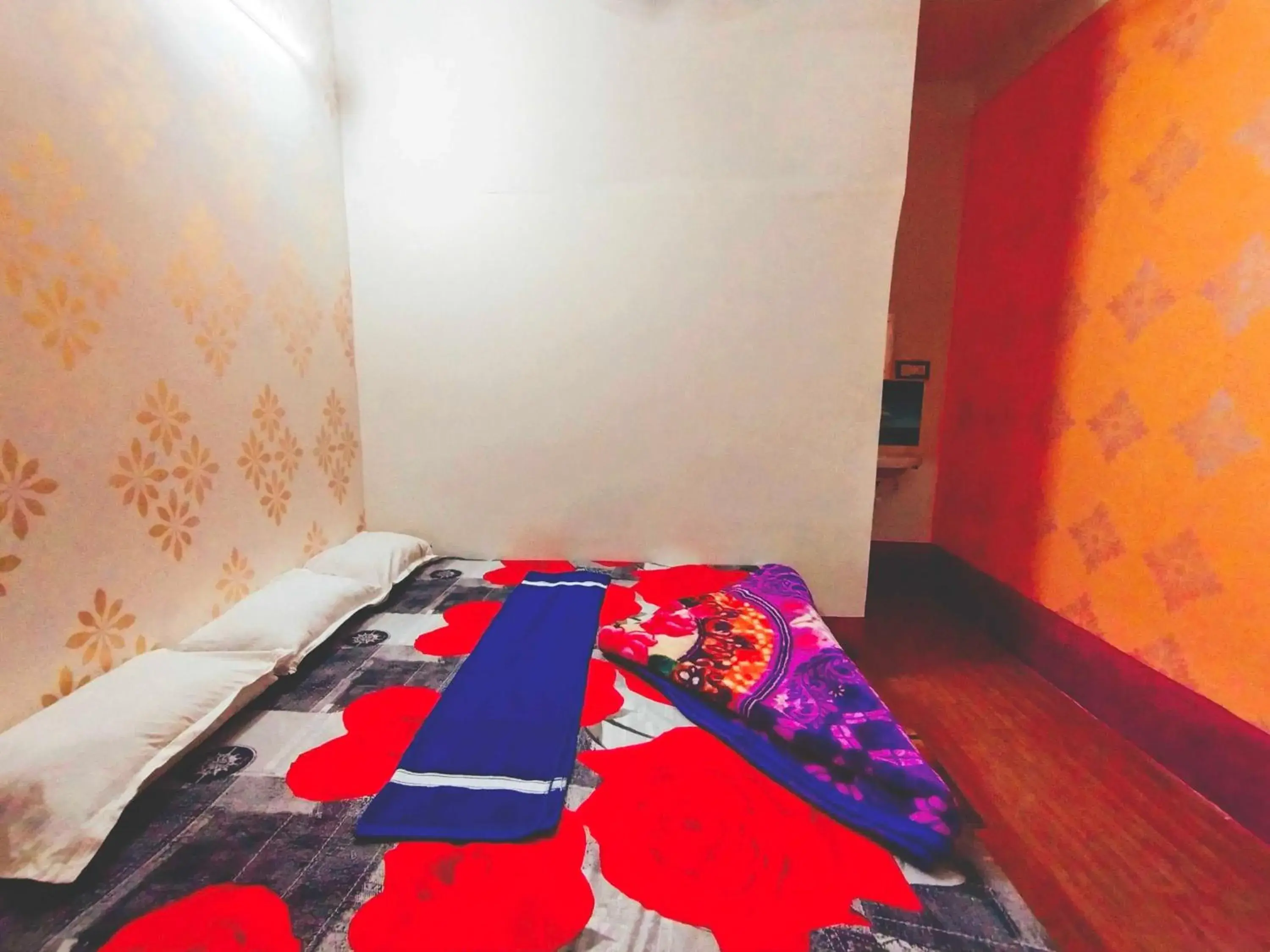 Bedroom in SPOT ON Ganguly Hotel Lodging And Fooding Bedroom in SPOT ON Ganguly Hotel Lodging And Fooding