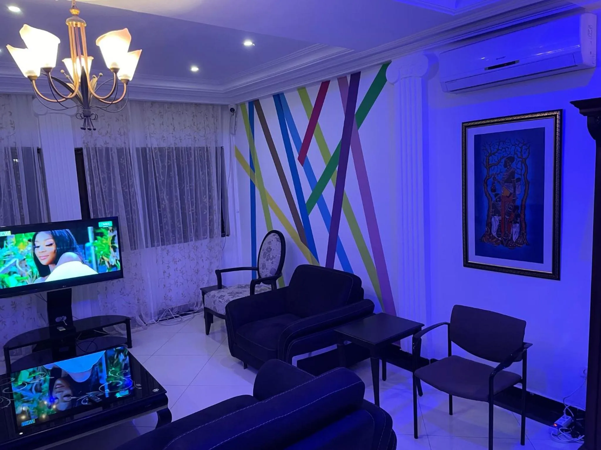 Communal lounge/ TV room in HOTEL LES ARCADES