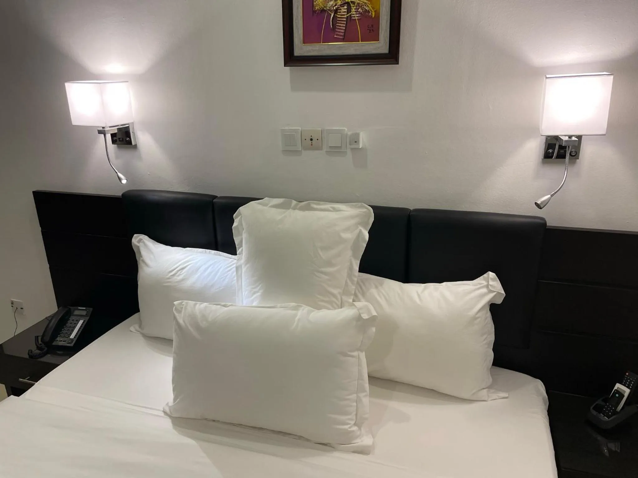 Bed in HOTEL LES ARCADES