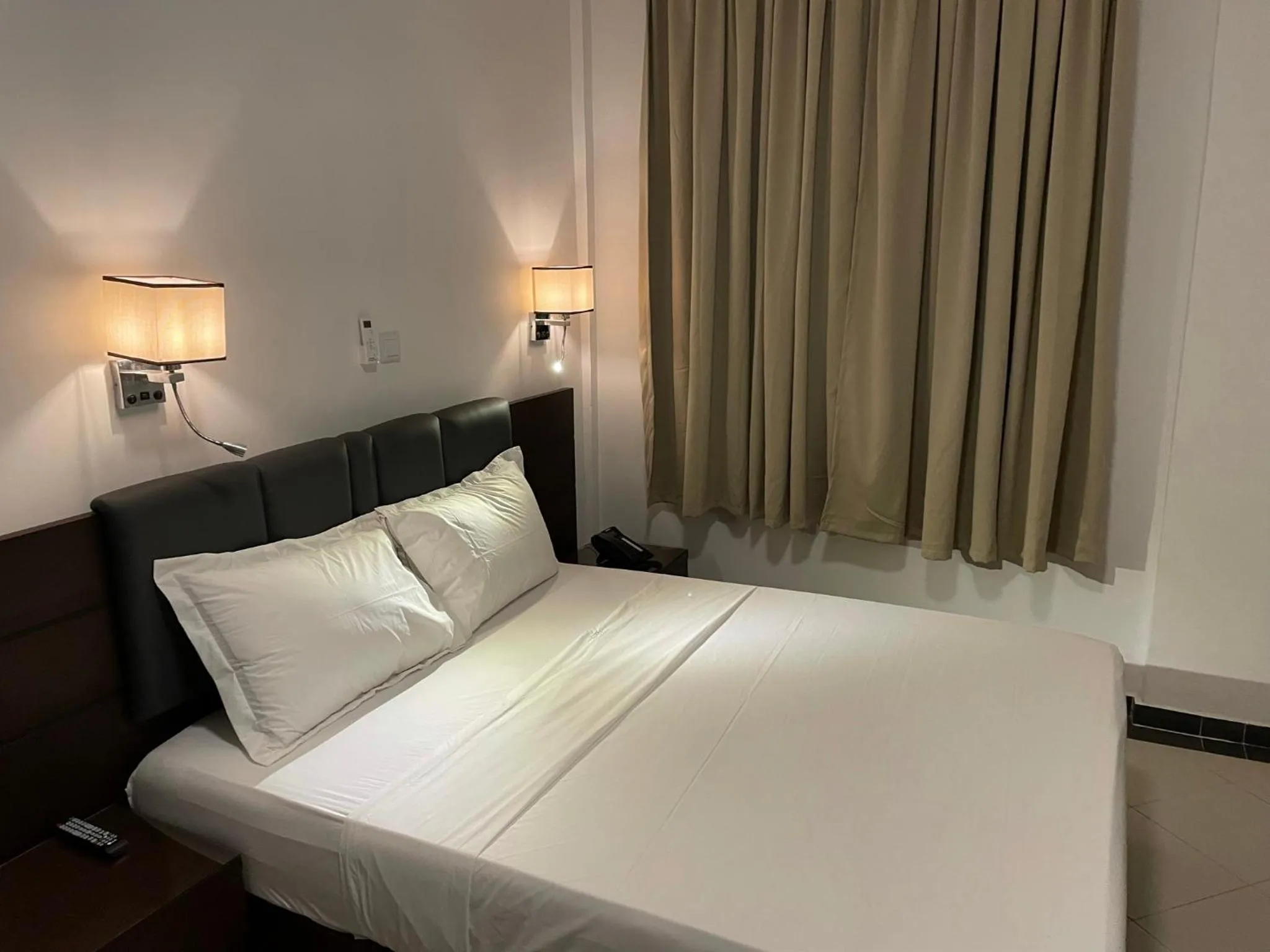 Bed in HOTEL LES ARCADES