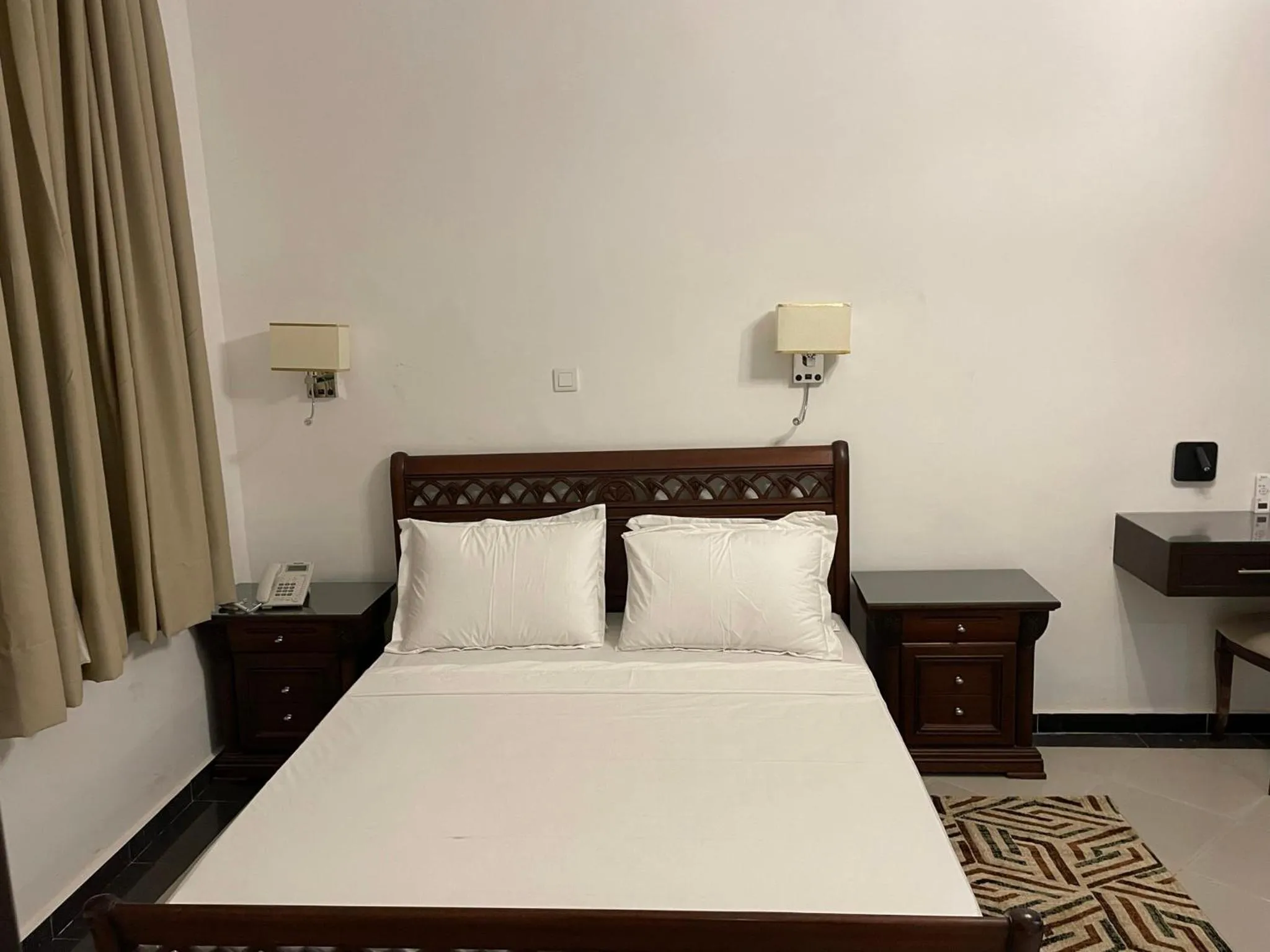 Bed in HOTEL LES ARCADES