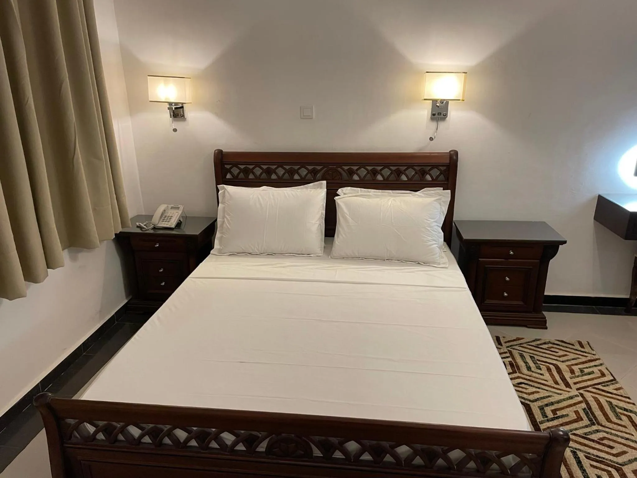 Bed in HOTEL LES ARCADES