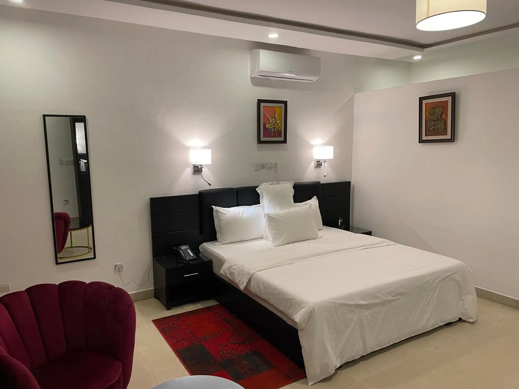 Bed in HOTEL LES ARCADES