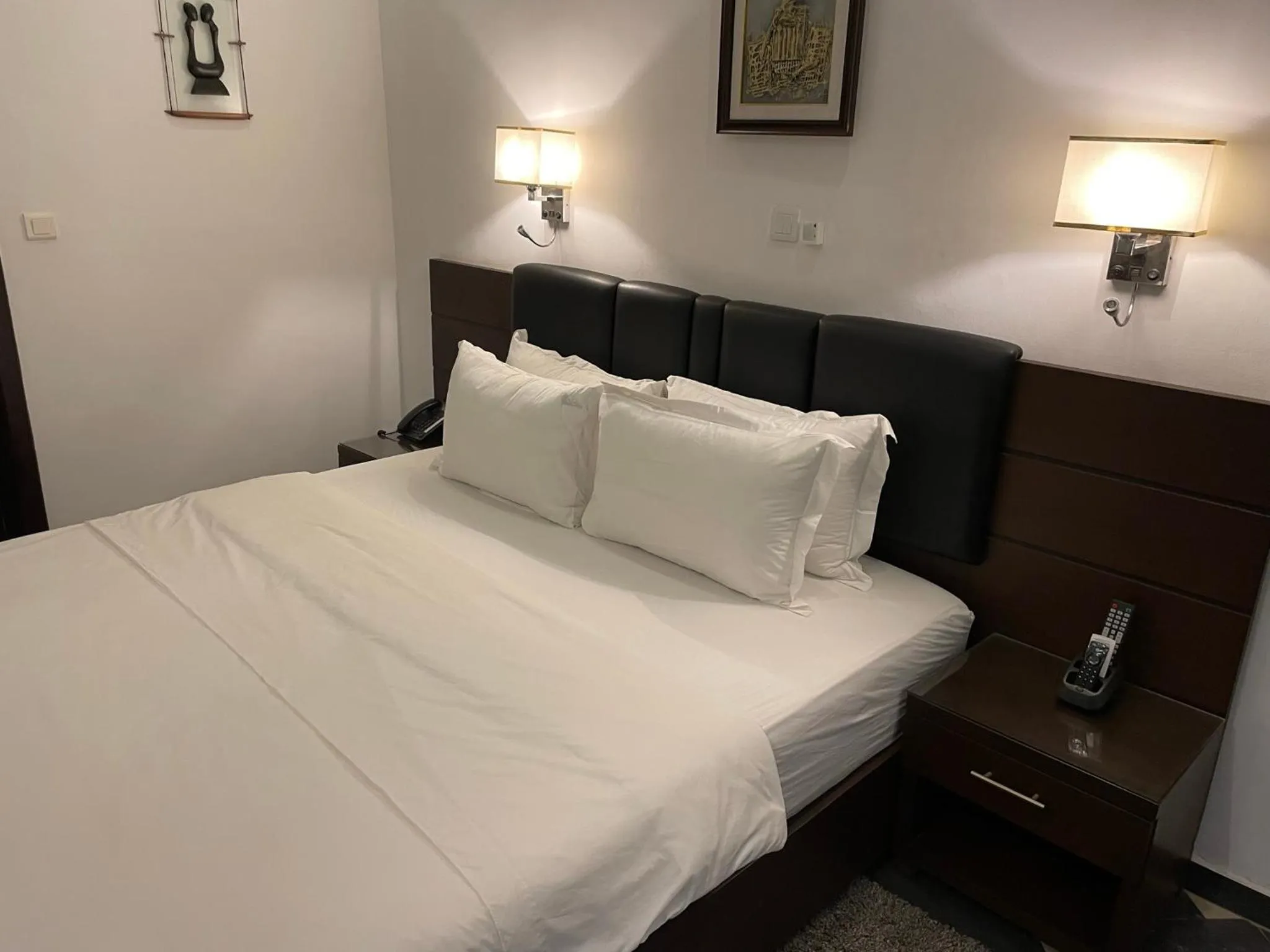 Bed in HOTEL LES ARCADES