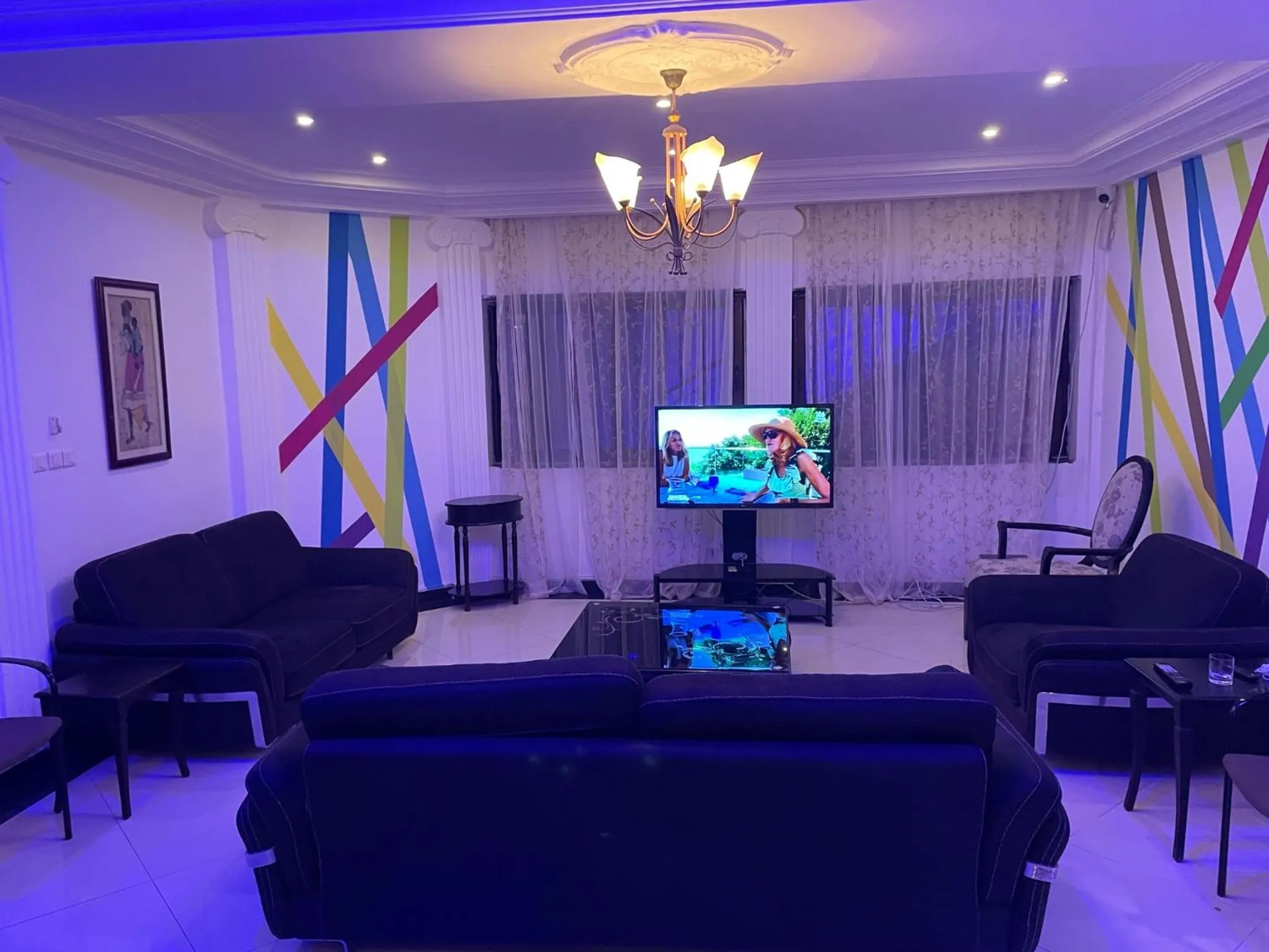 Communal lounge/ TV room in HOTEL LES ARCADES