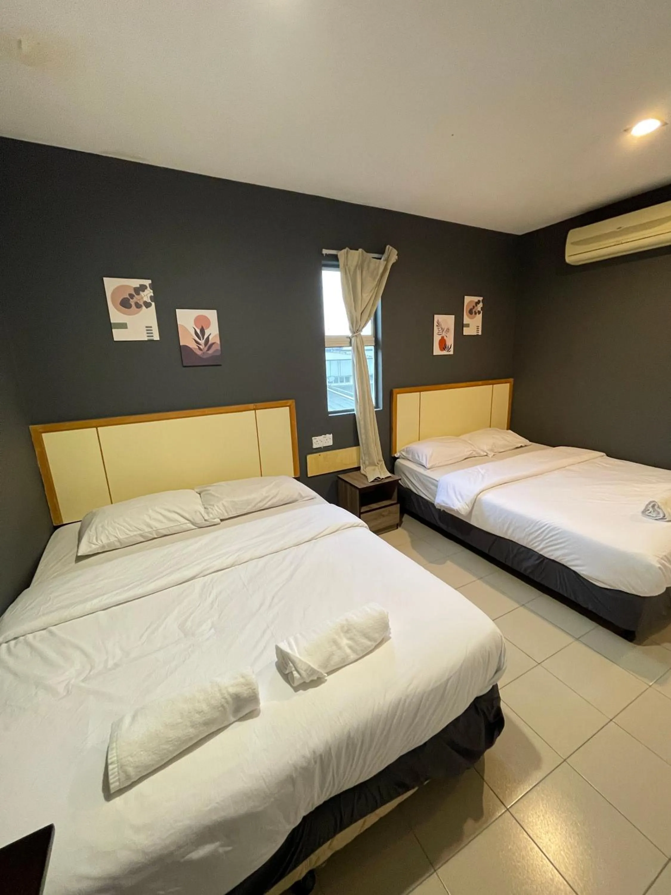 Bed in Fresh Hotel Falim