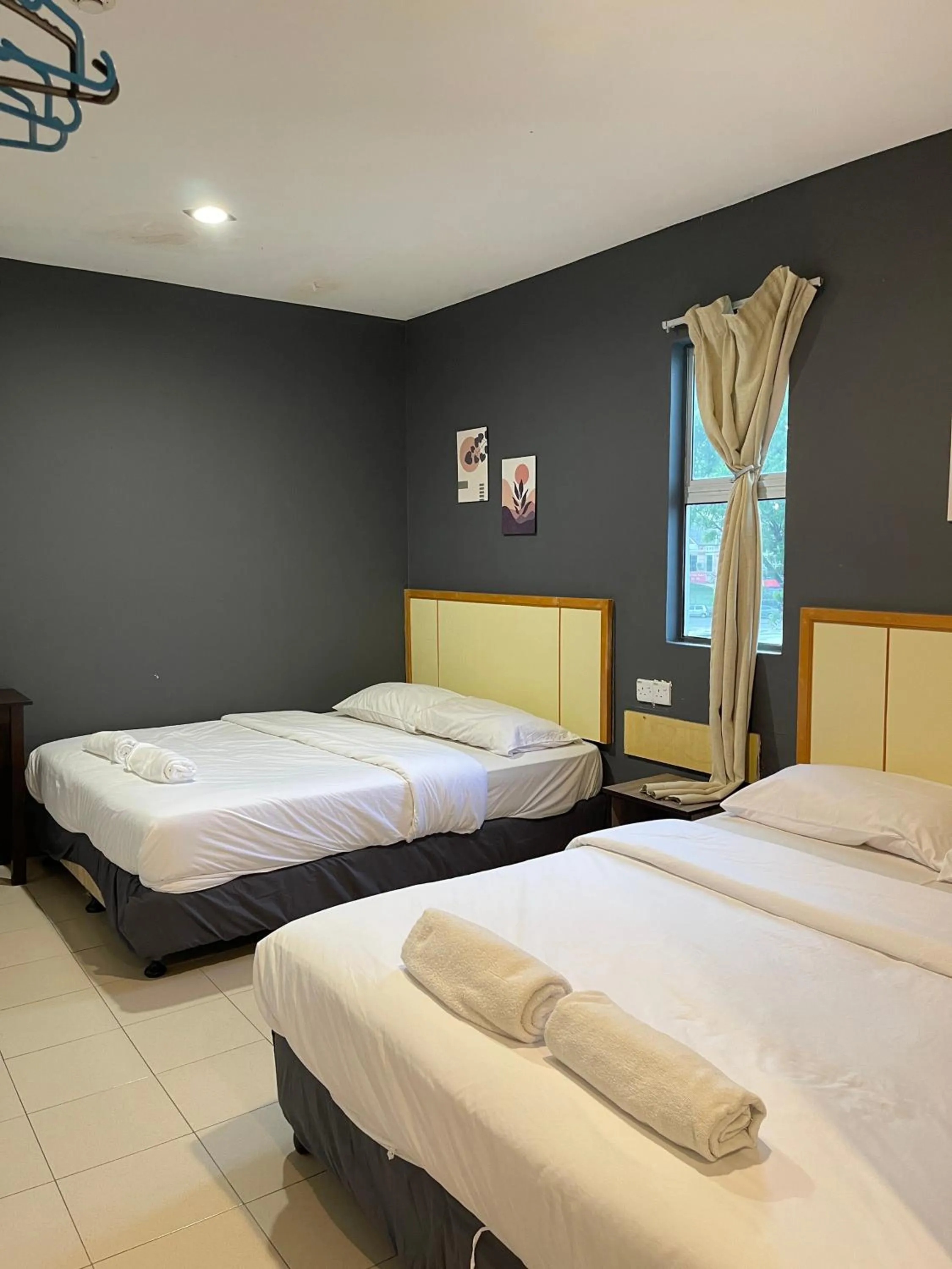 Bed in Fresh Hotel Falim