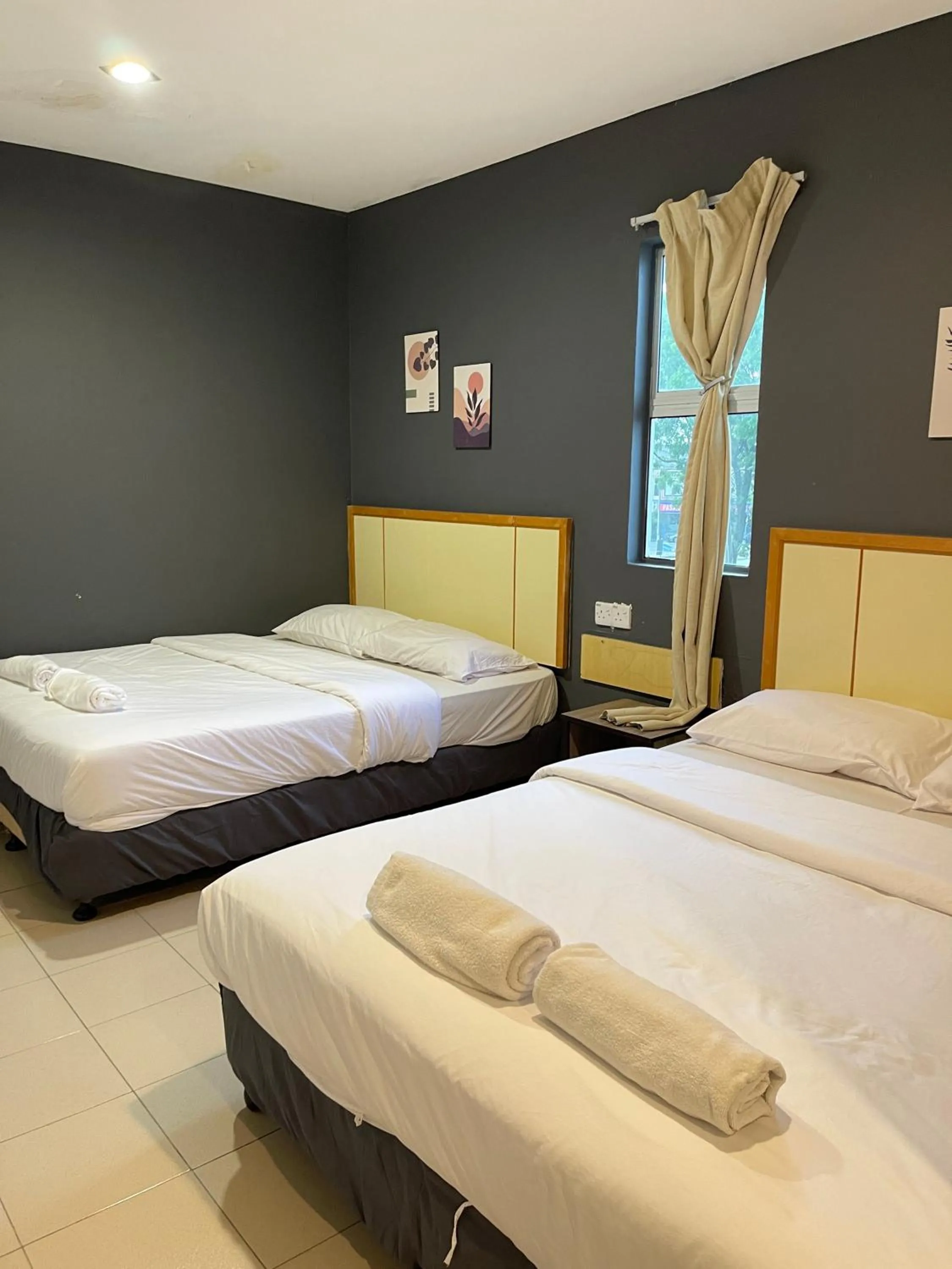 Bed in Fresh Hotel Falim