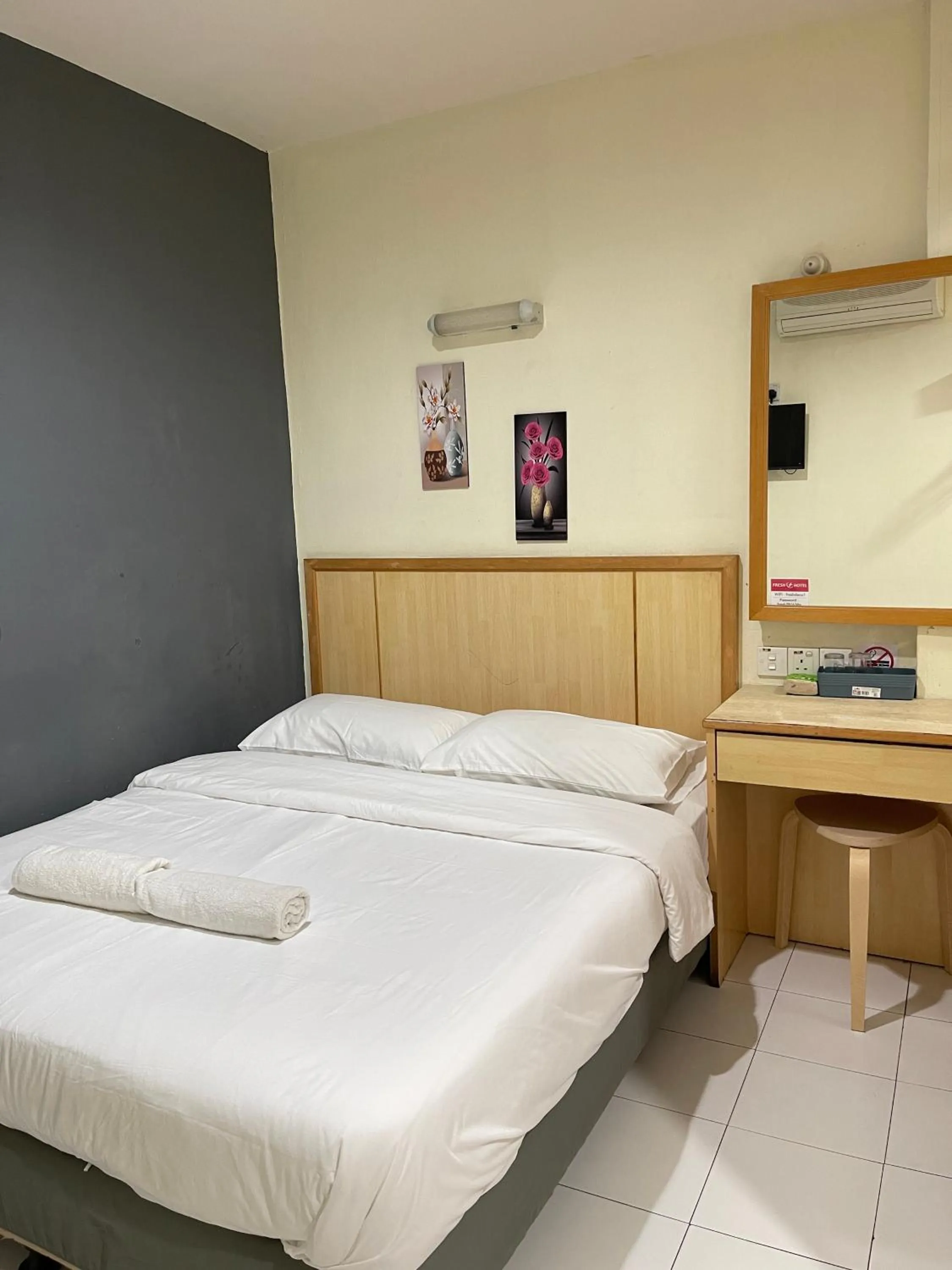 Bed in Fresh Hotel Falim