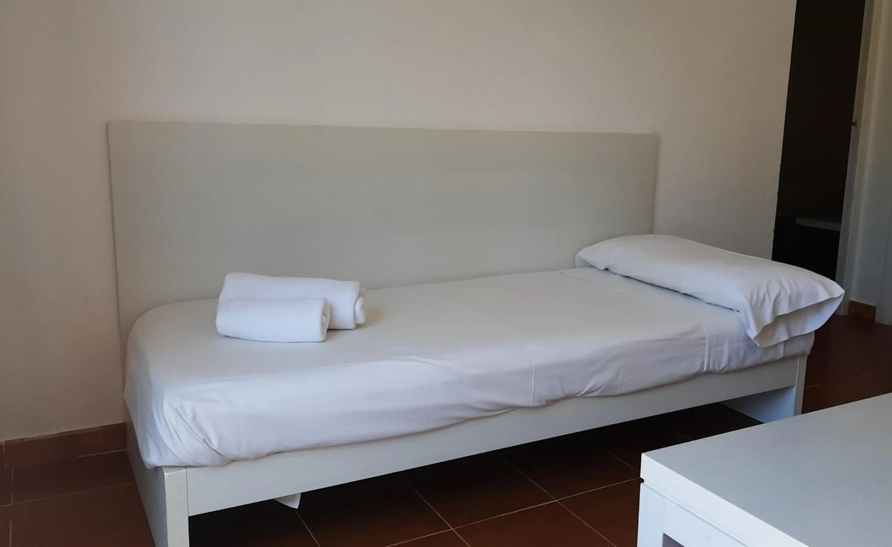 Living room, Bed in Aparthotel FLORA PARK & AQUAROCK Living room, Bed in Aparthotel FLORA PARK & AQUAROCK