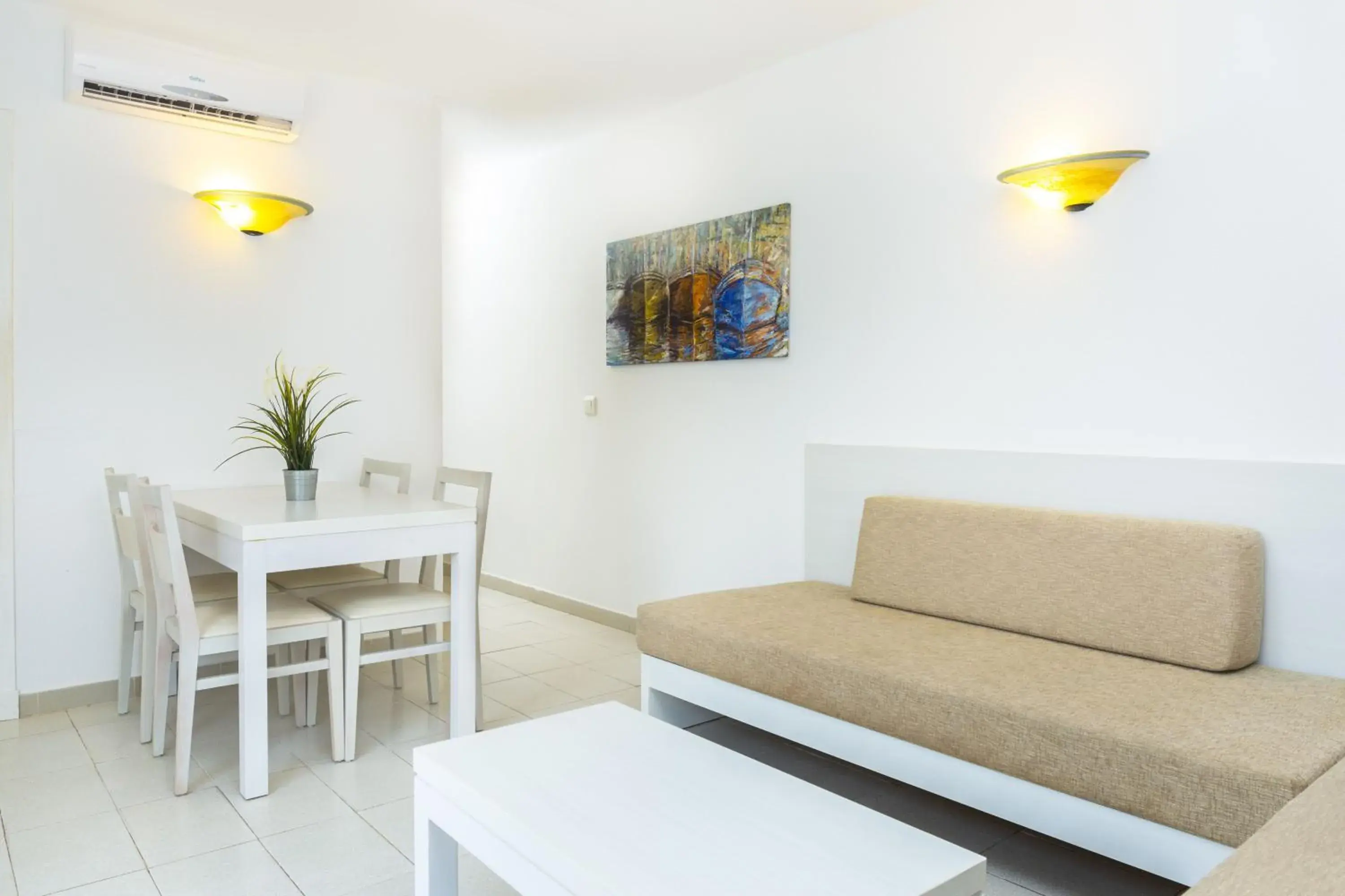 Living room in Aparthotel FLORA PARK & AQUAROCK Living room in Aparthotel FLORA PARK & AQUAROCK