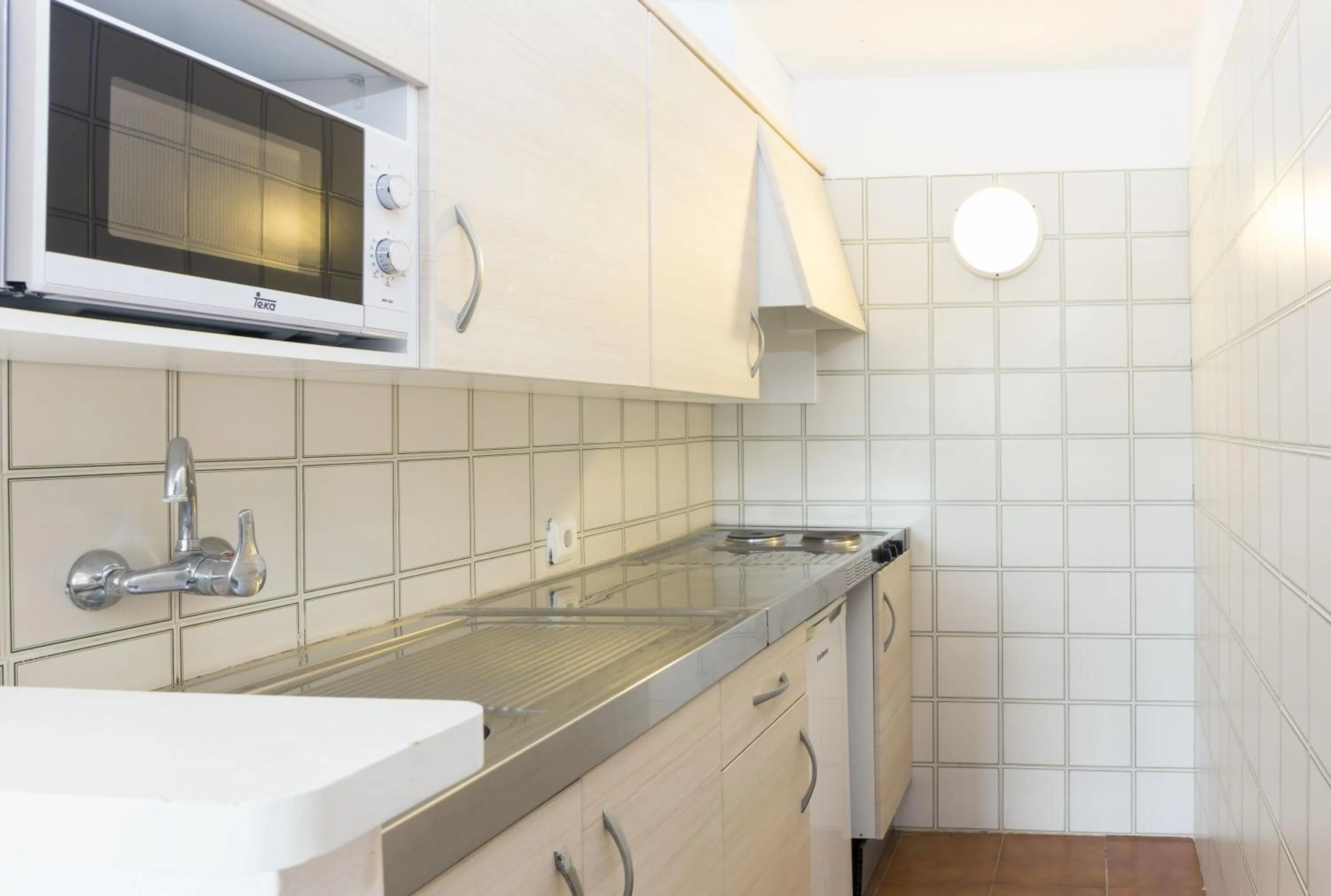 Kitchen or kitchenette in Aparthotel FLORA PARK & AQUAROCK