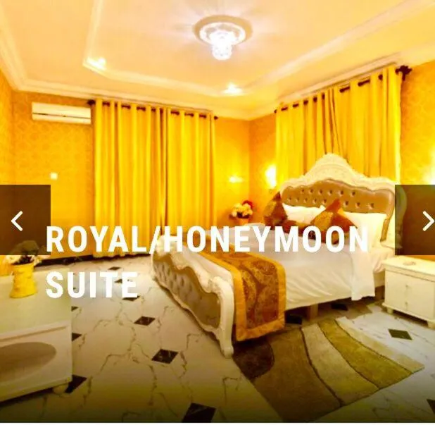 Bedroom in Amazing Grace Hotel & Suites