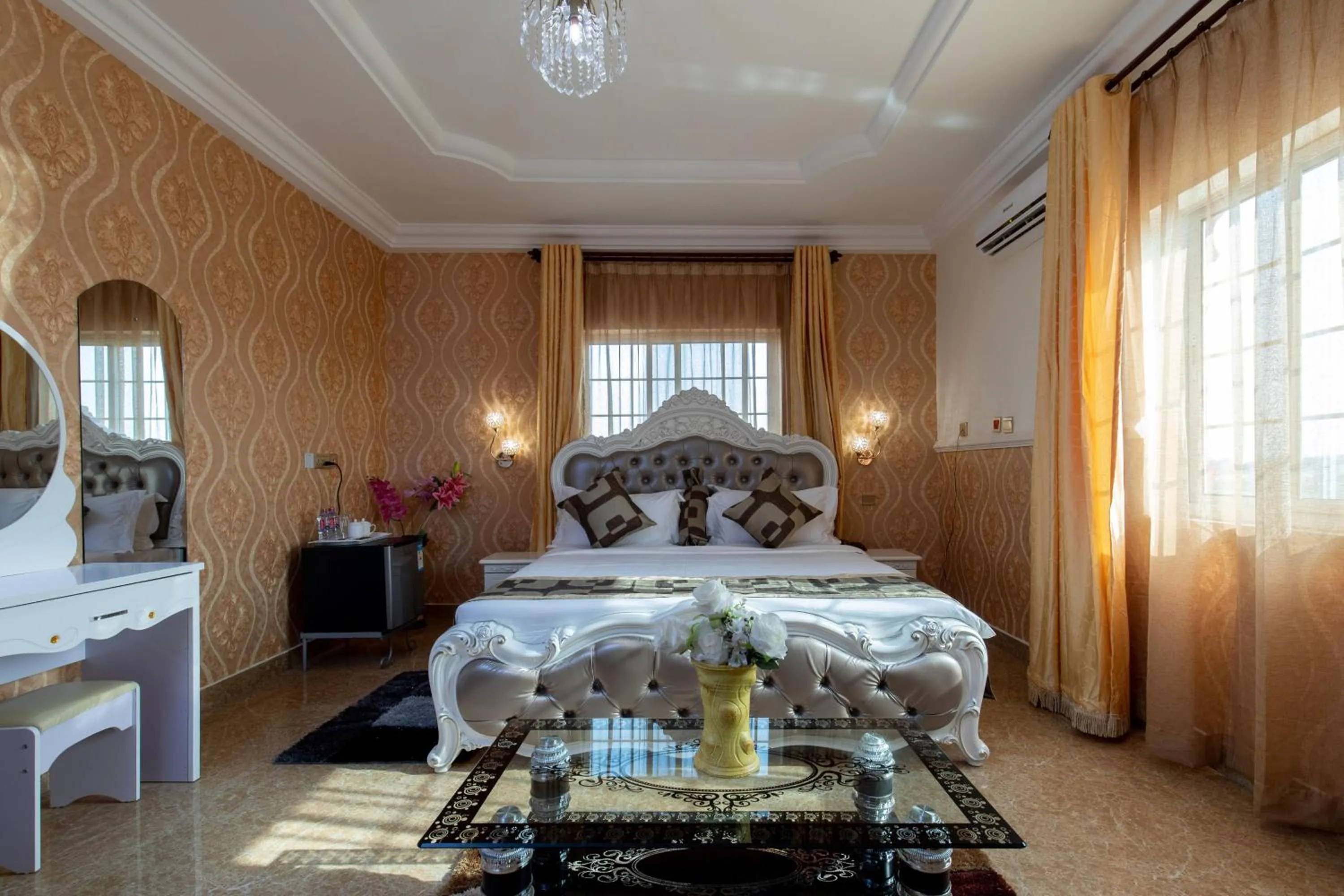 Bedroom in Amazing Grace Hotel & Suites