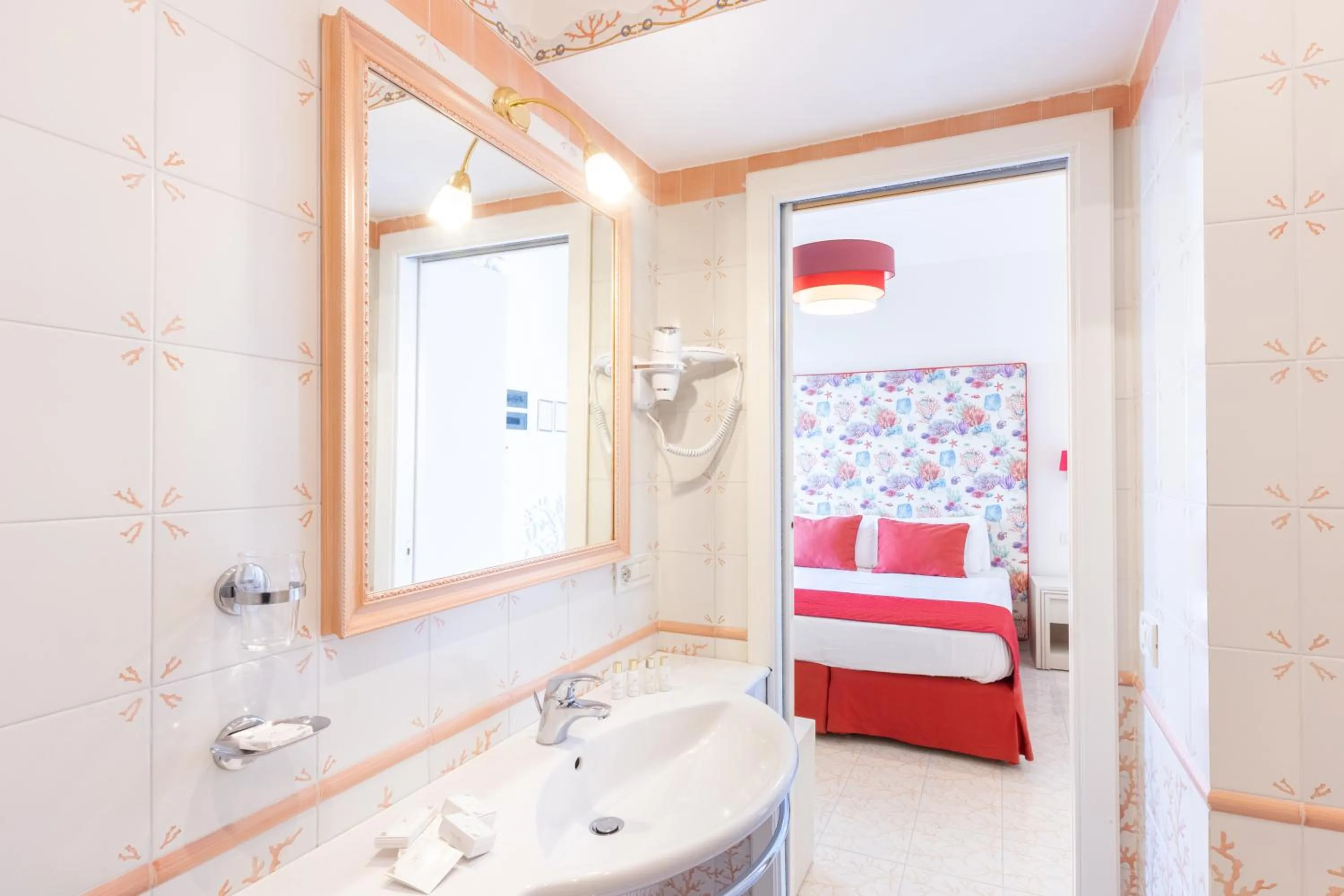 Bed in Hotel Corallo Sorrento