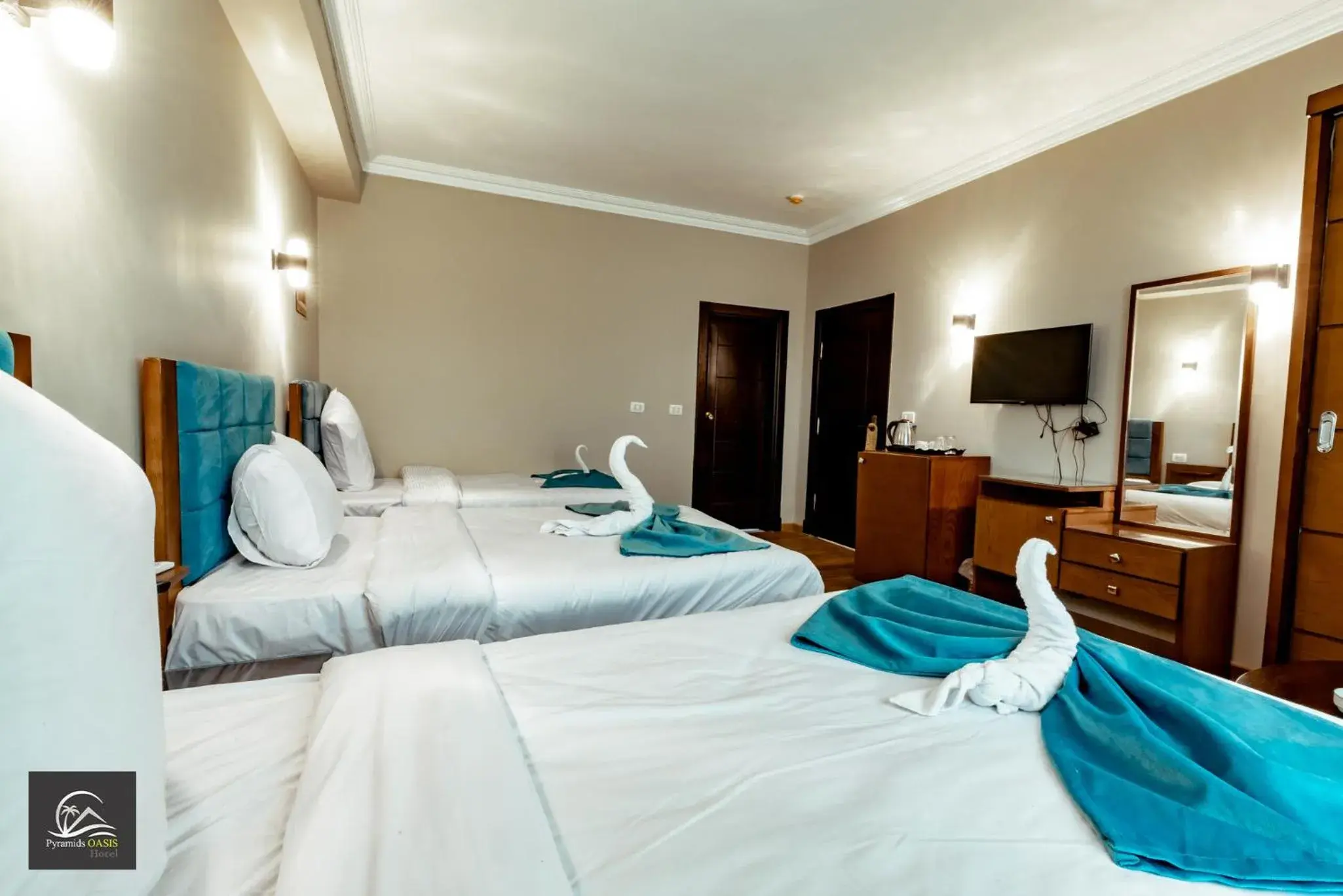 Communal lounge/ TV room, Bed in Pyramids Oasis Hotel Communal lounge/ TV room, Bed in Pyramids Oasis Hotel