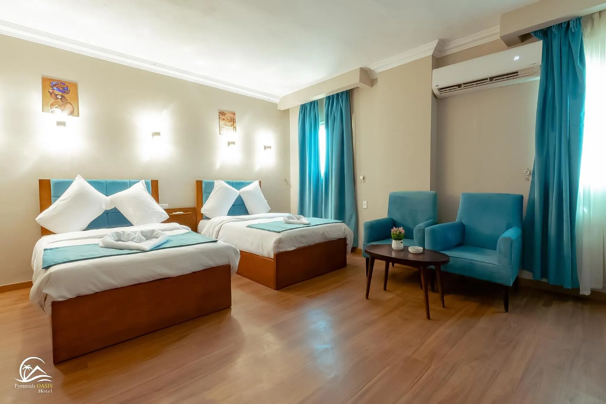 Bed in Pyramids Oasis Hotel