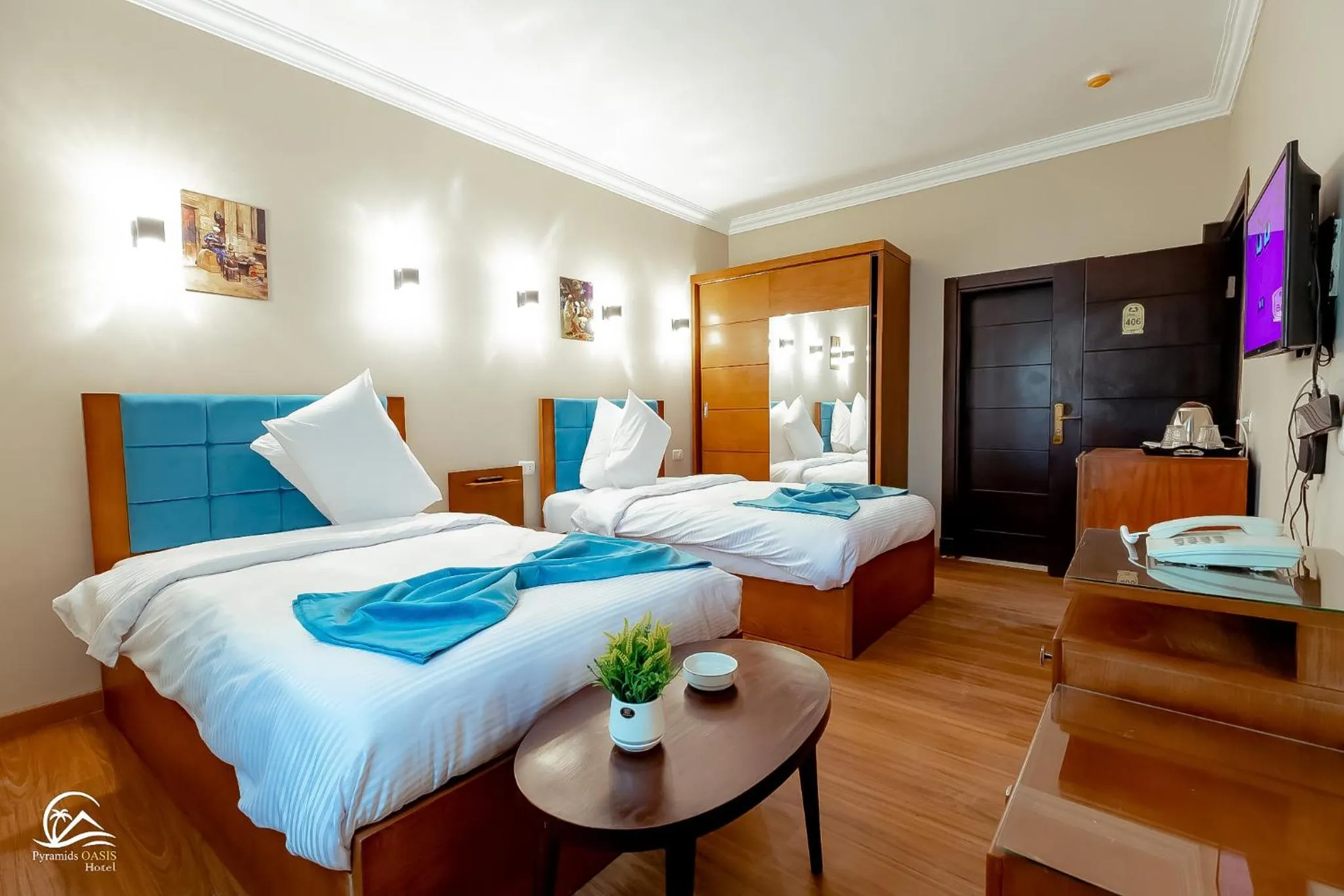 Bed in Pyramids Oasis Hotel