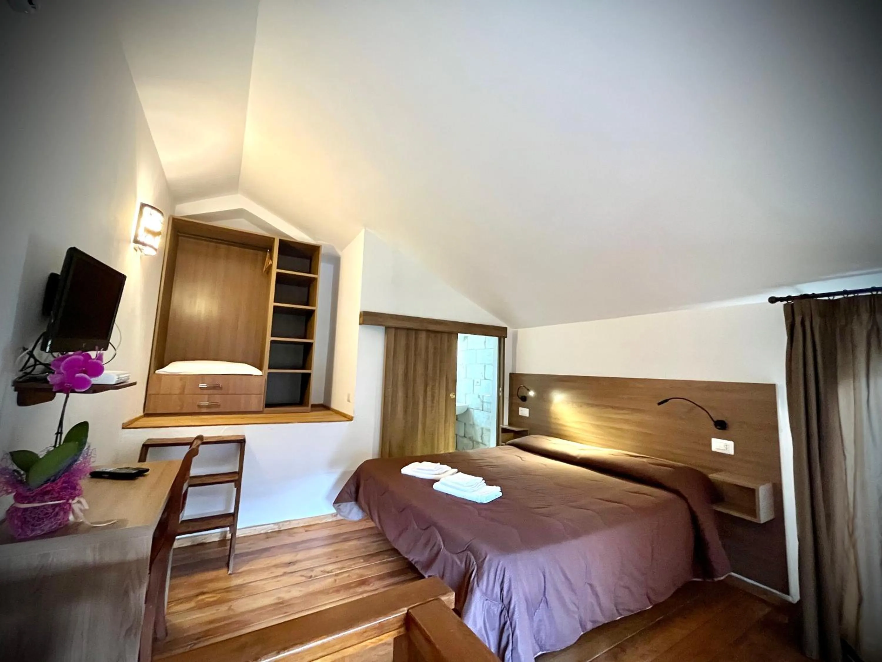 Bed in Hotel Pinguino