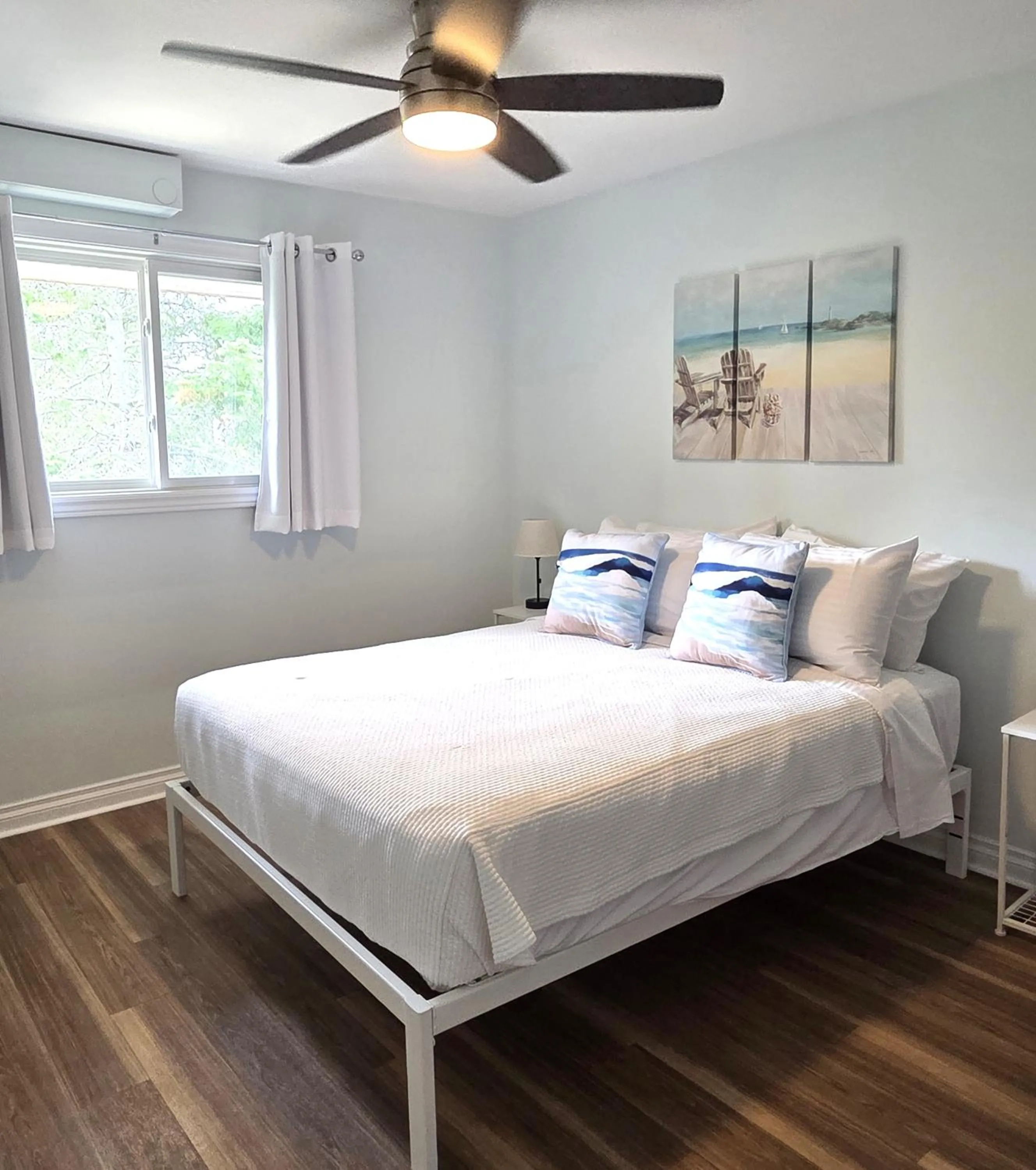 Bed in Oasis by the Bay Vacation Suites