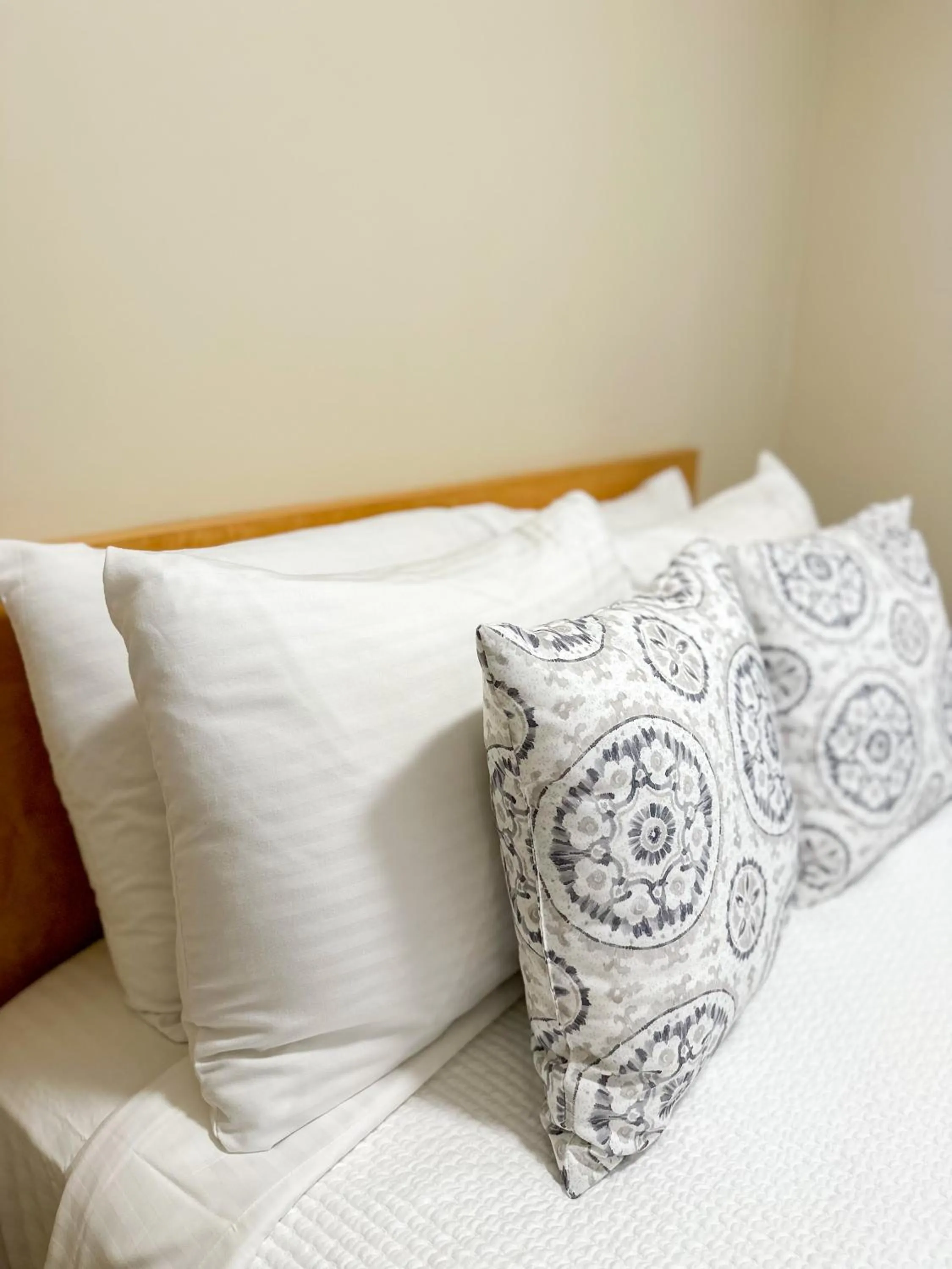 Bed in Oasis by the Bay Vacation Suites