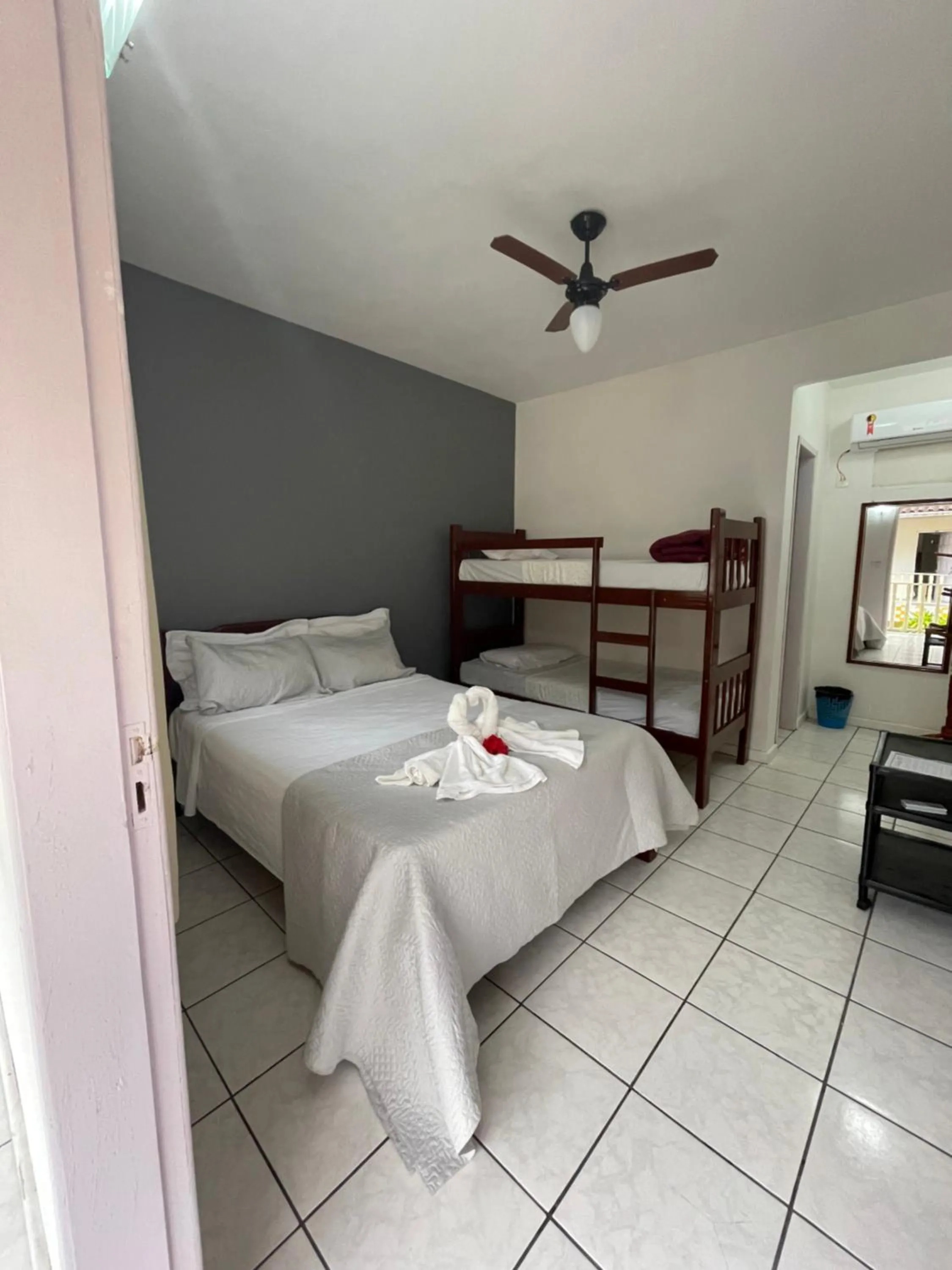 Bed in Pousada Frezza Mergulho