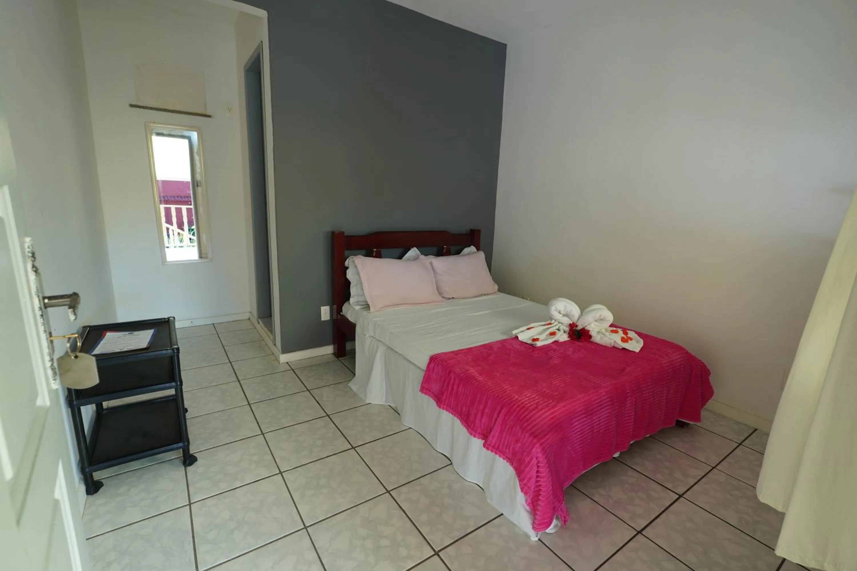 Bed in Pousada Frezza Mergulho