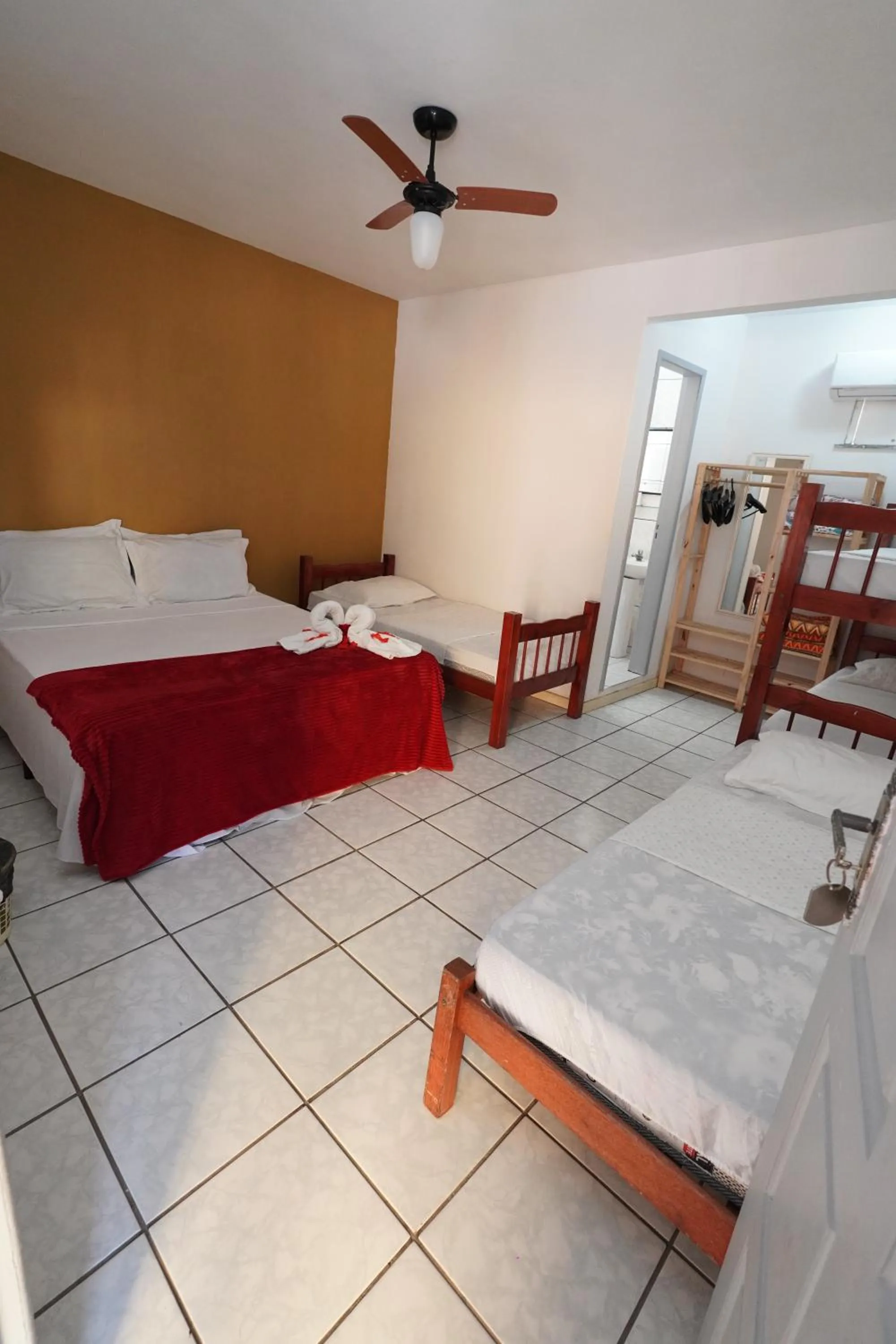 Bed in Pousada Frezza Mergulho