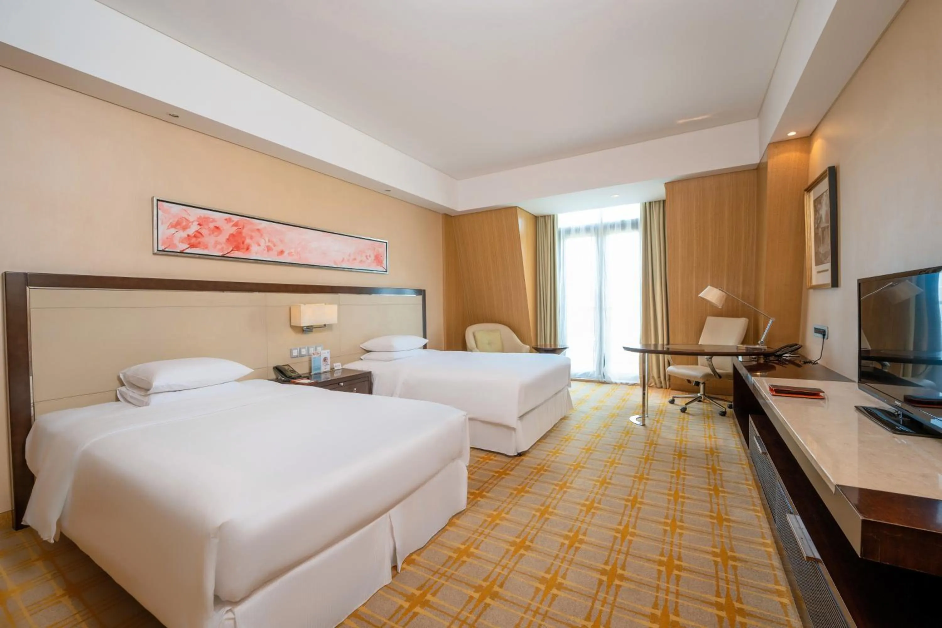 Bed in Sheraton Qinhuangdao Beidaihe Hotel