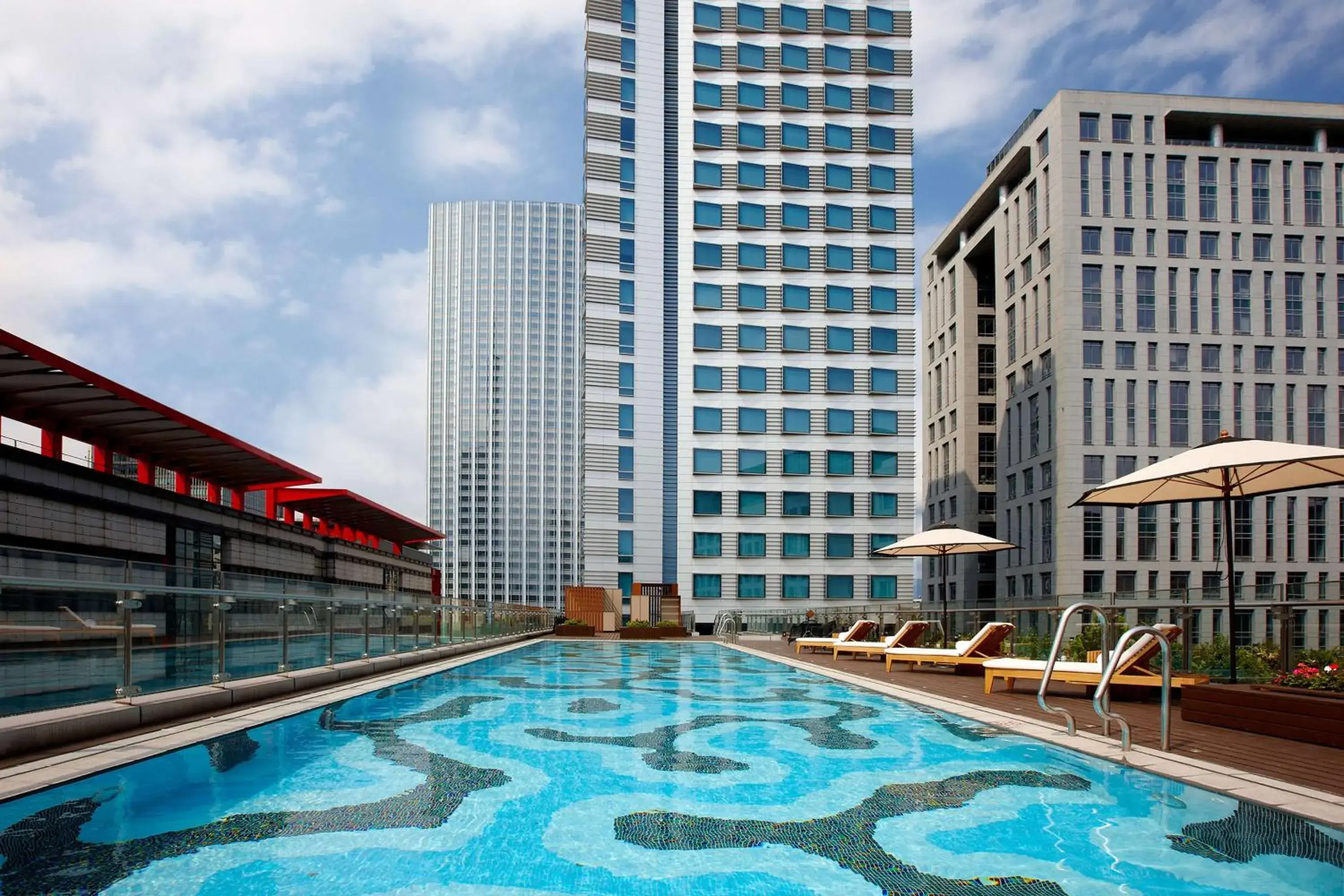 Pool view in Humble House Taipei, Curio Collection by Hilton Pool view in Humble House Taipei, Curio Collection by Hilton