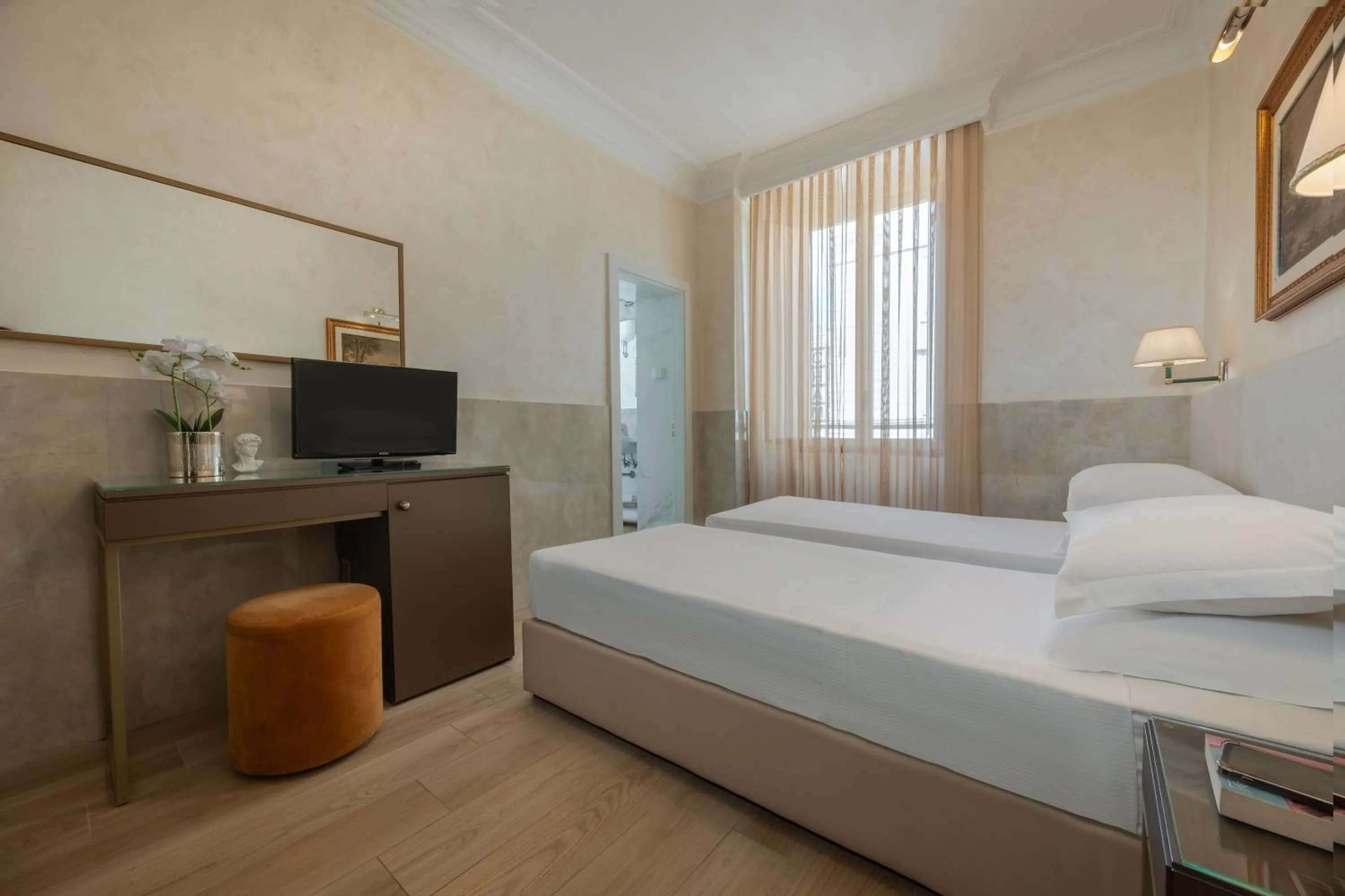 Bed in Hotel Palladium Palace