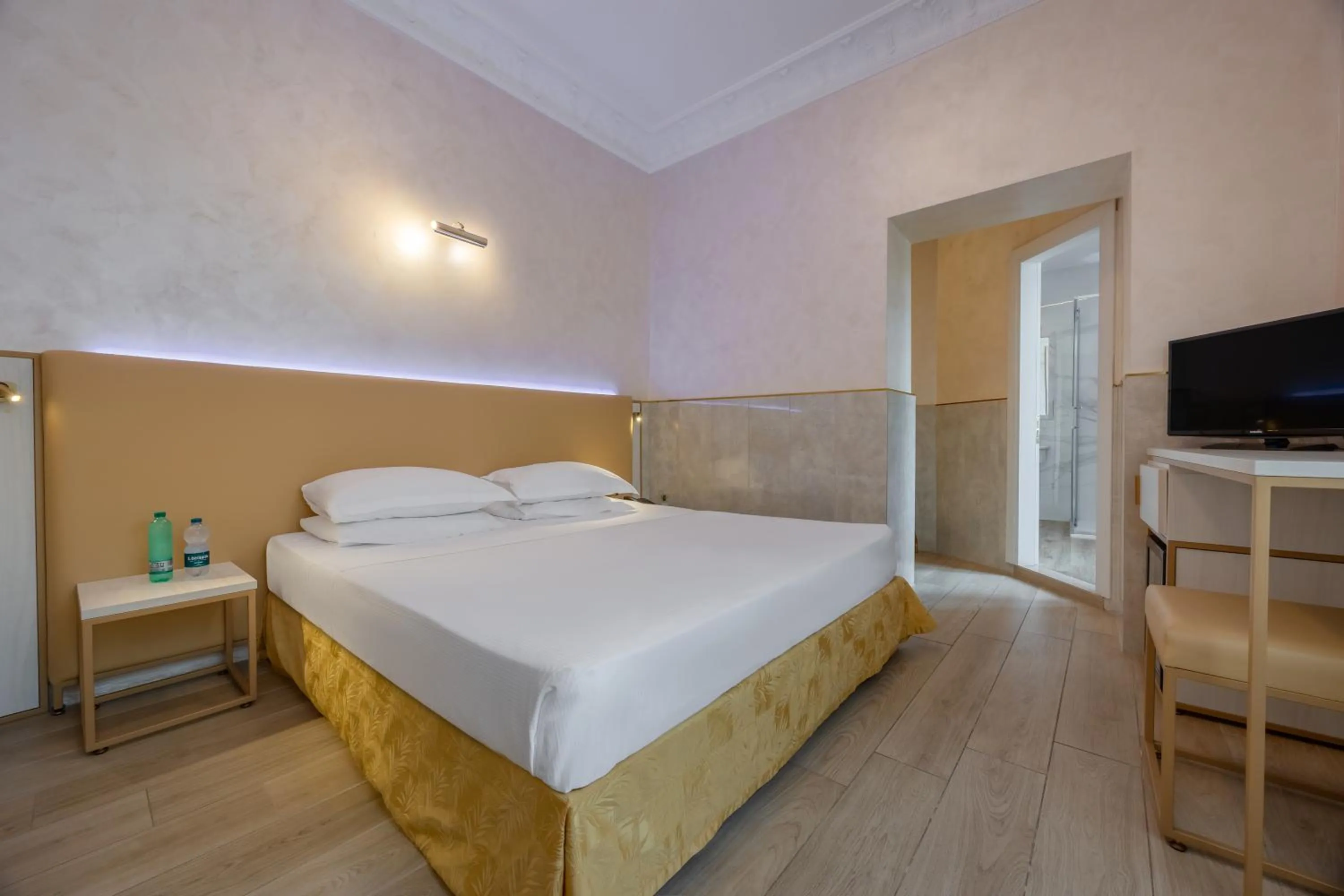 Bed in Hotel Palladium Palace