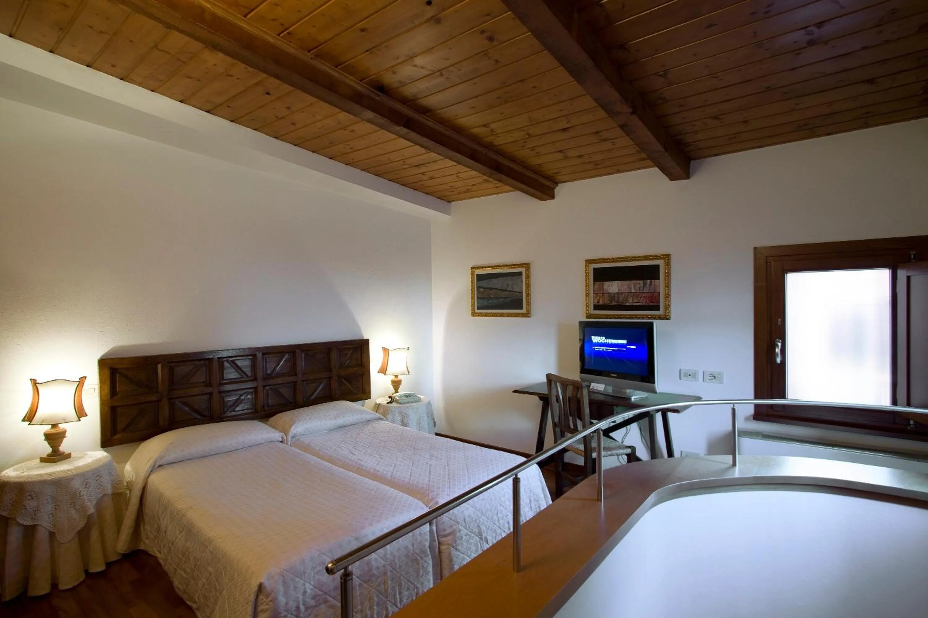 Bed in Hotel Columbia