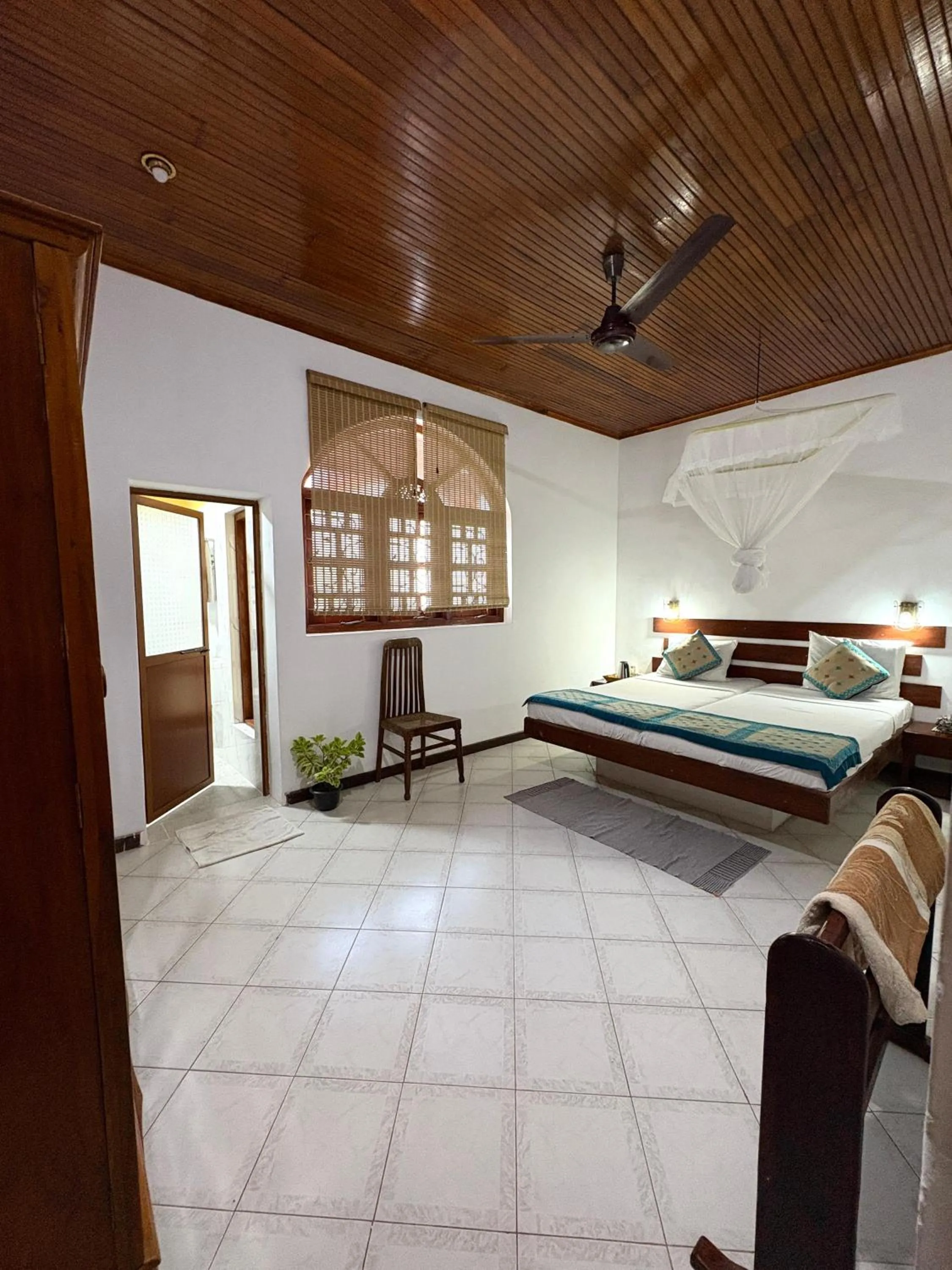 Bed in Chaya Villa Guest House